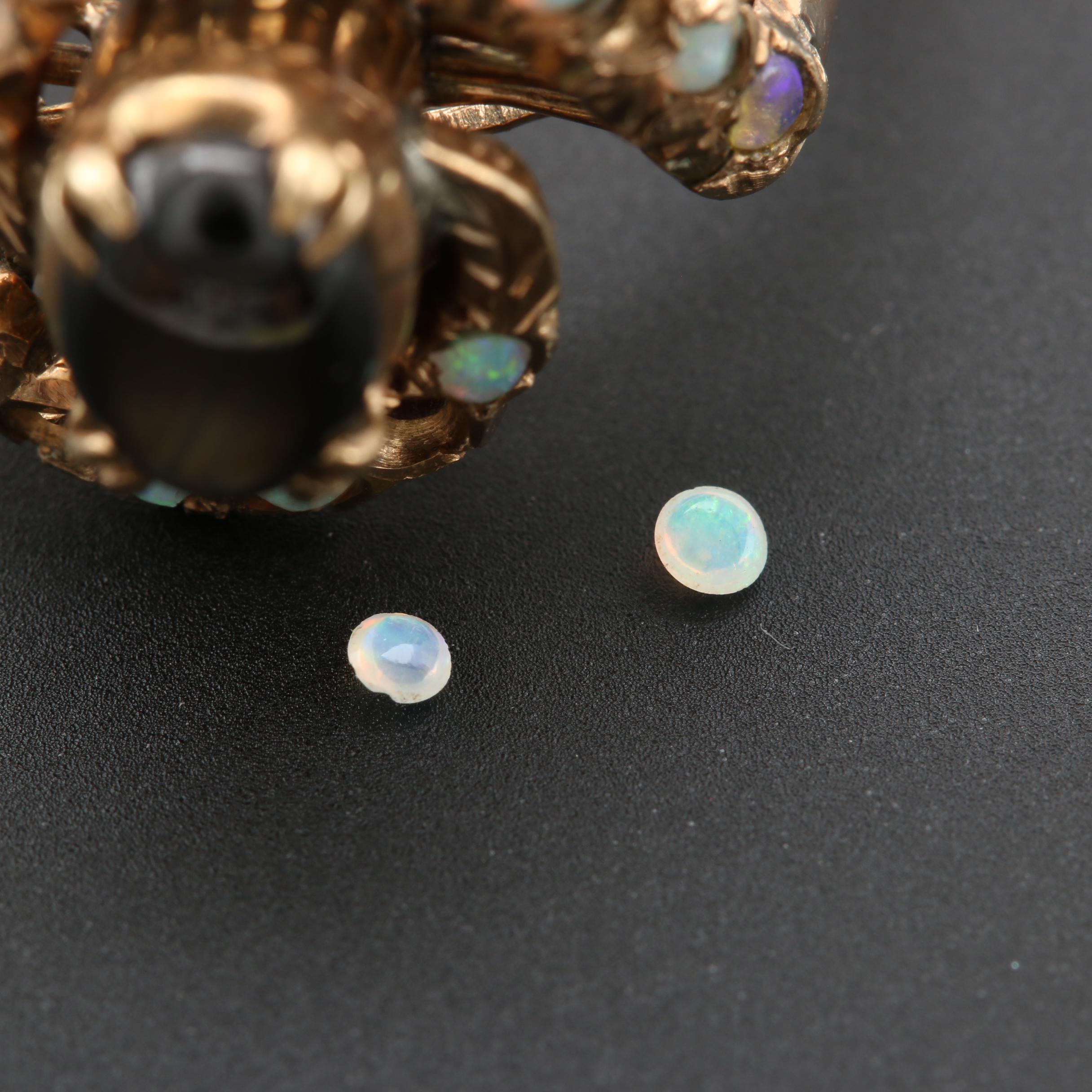 Vintage 14K Yellow Gold Black Star Sapphire and Opal Ring