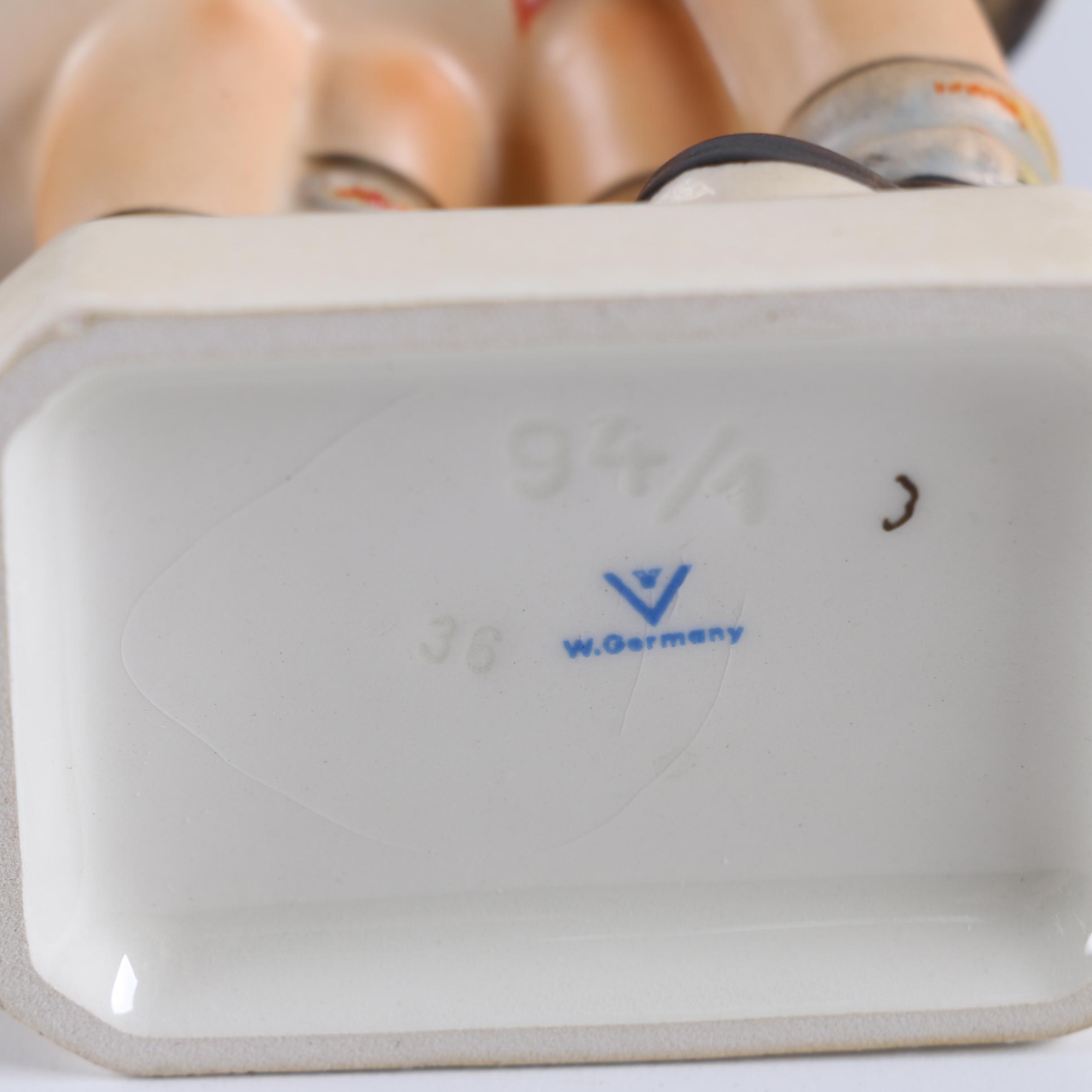 Vintage Hummel Figurines including "Little Hiker" and "Post Man"