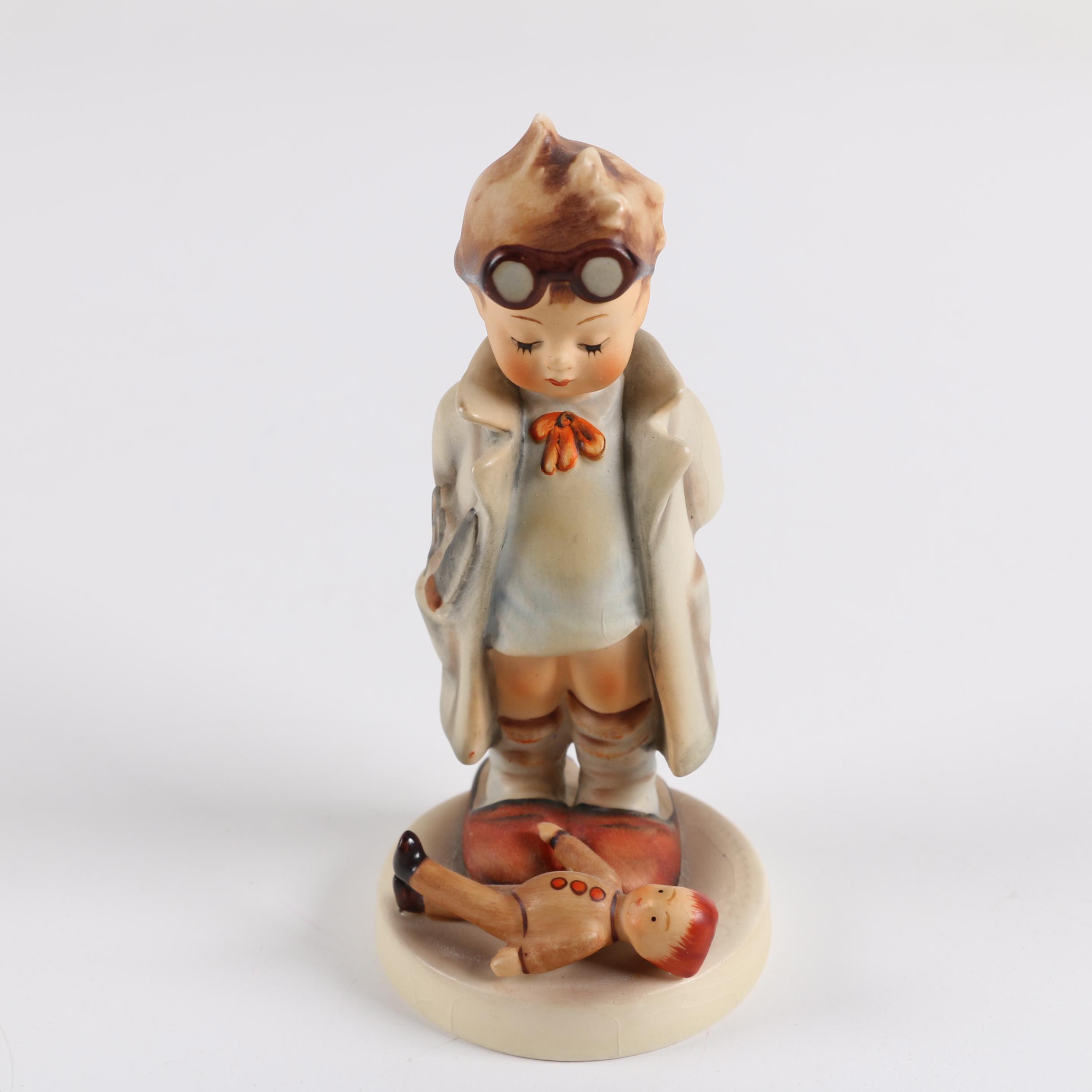Vintage Hummel Figurines including "Little Hiker" and "Post Man"