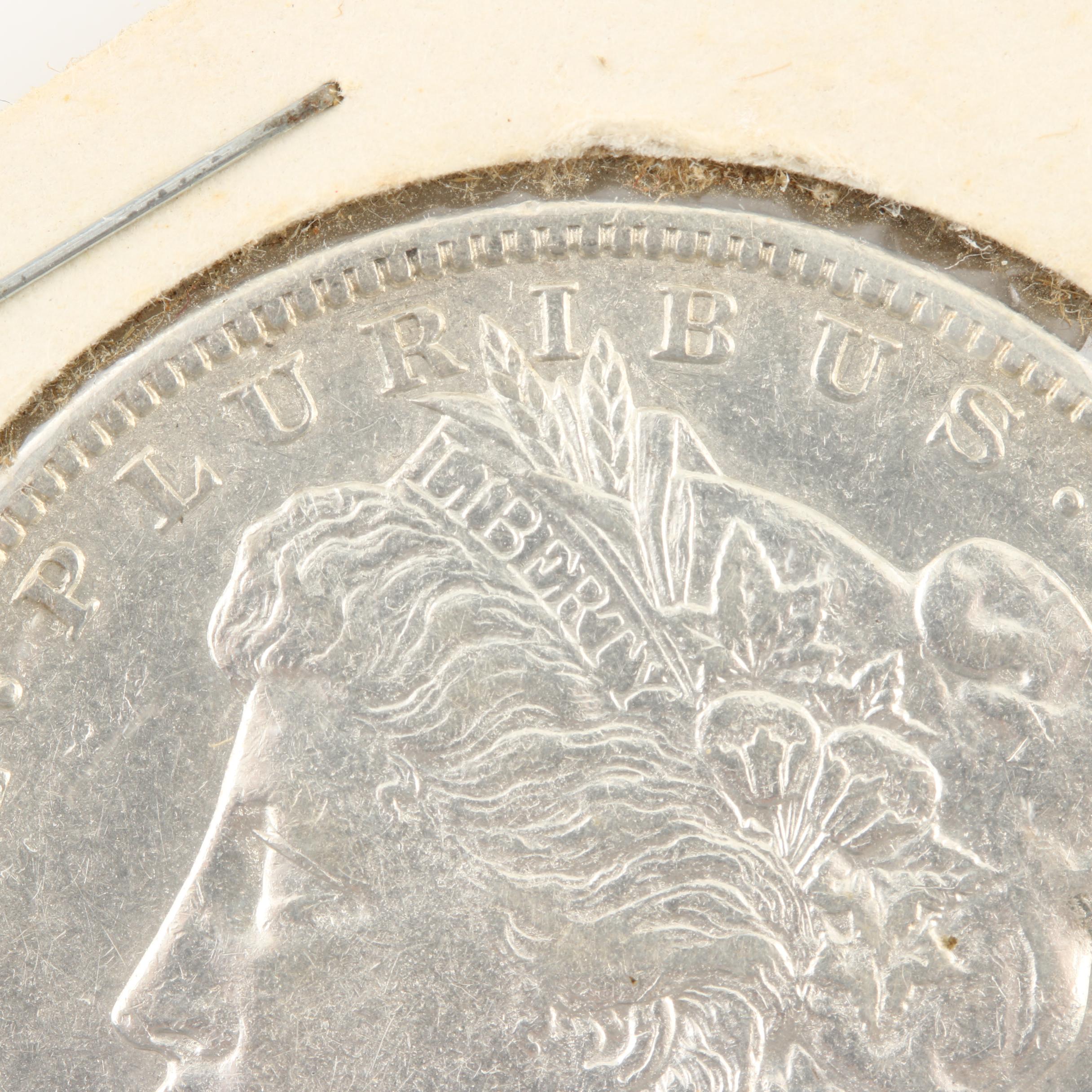 Ten Morgan Silver Dollars