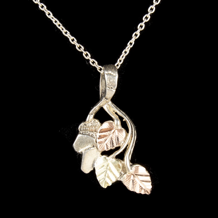 Sterling Silver Floral Pendant Necklace With Yellow and Rose Gold Plated Accents