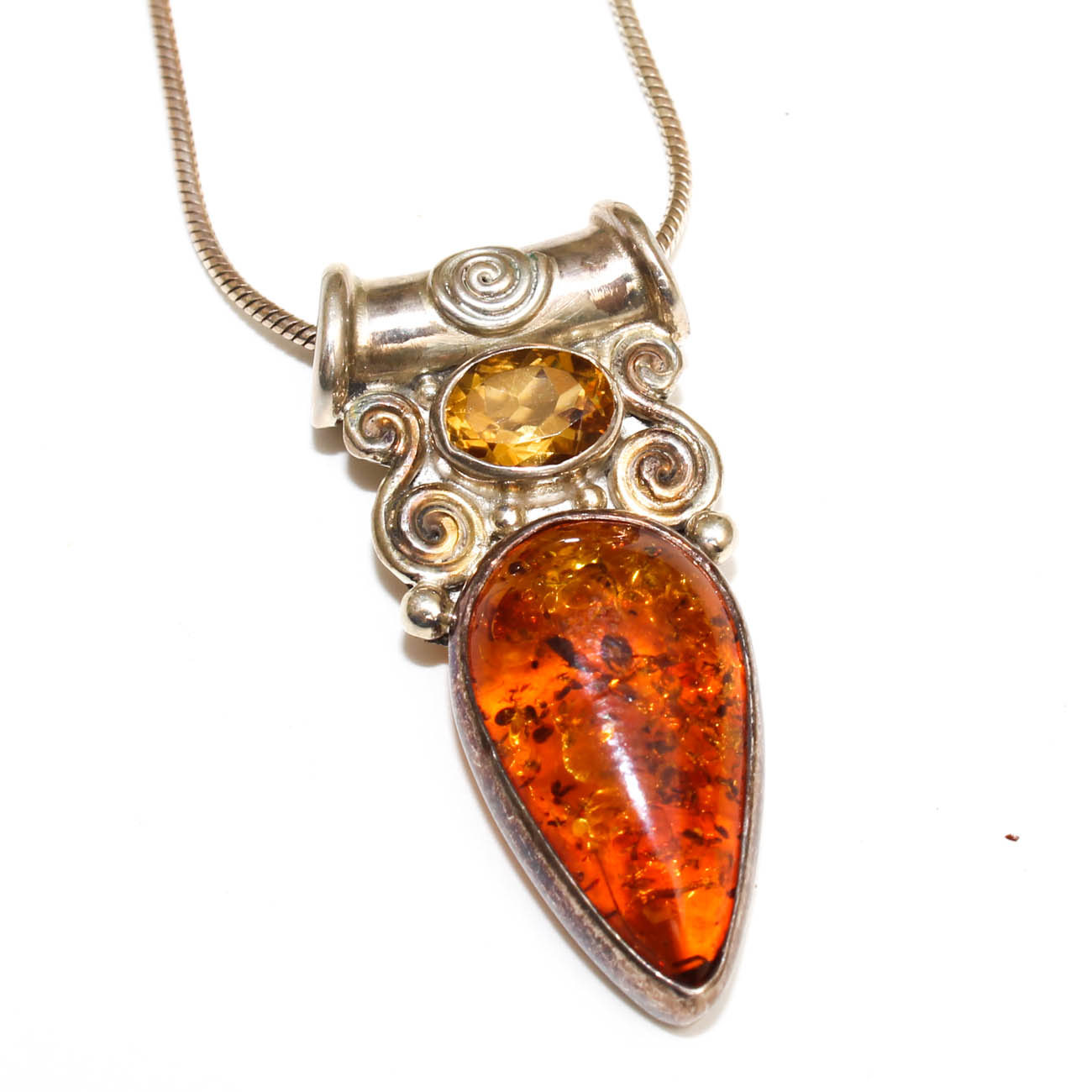 Sterling Silver and Amber Pendants and Figural Brooches including Sajen