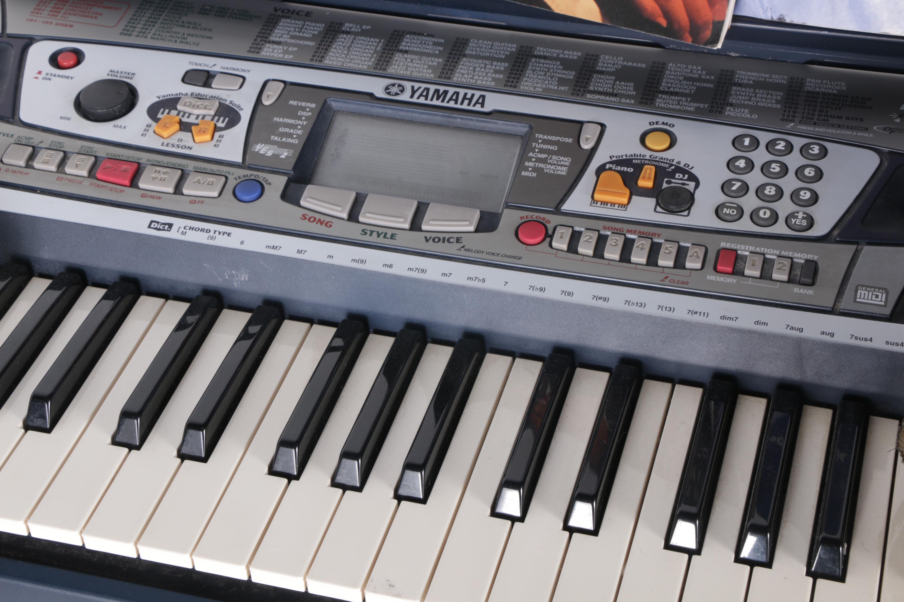 Yamaha Portatone PSR-282 Electric Keyboard with Stand and Gig Bag