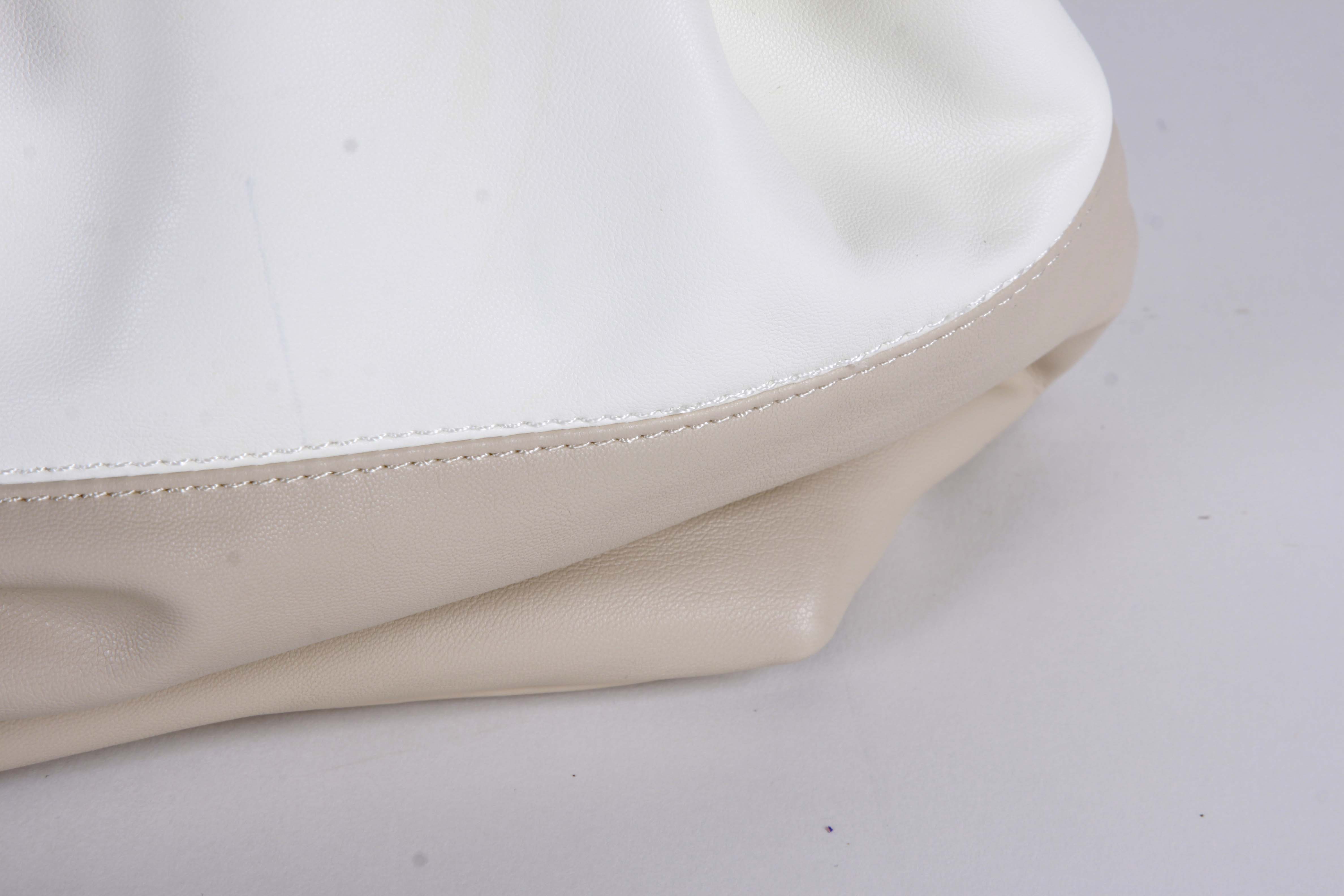 Pairing of Leather Handbags including Tory Burch Handbags