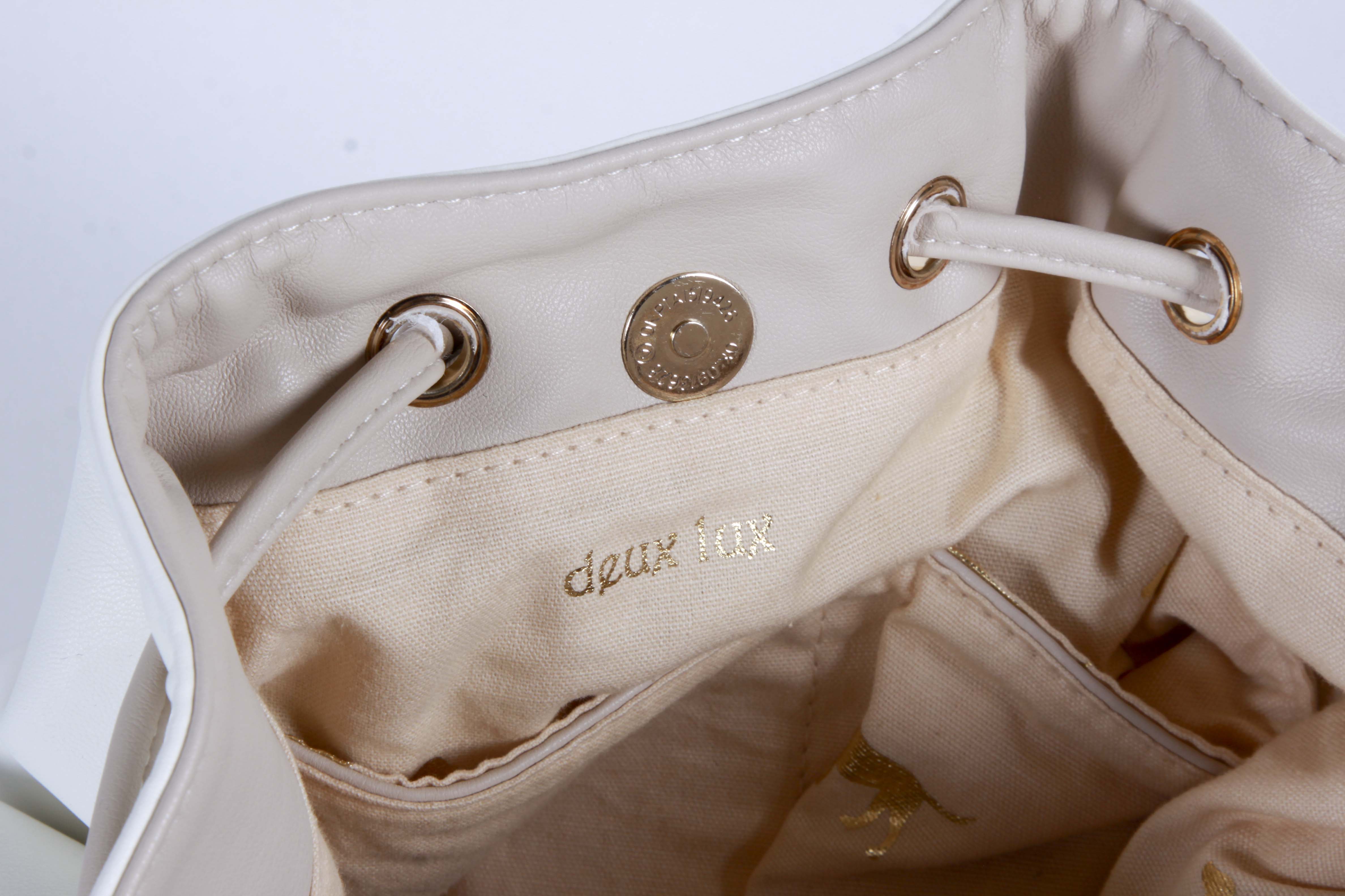 Pairing of Leather Handbags including Tory Burch Handbags