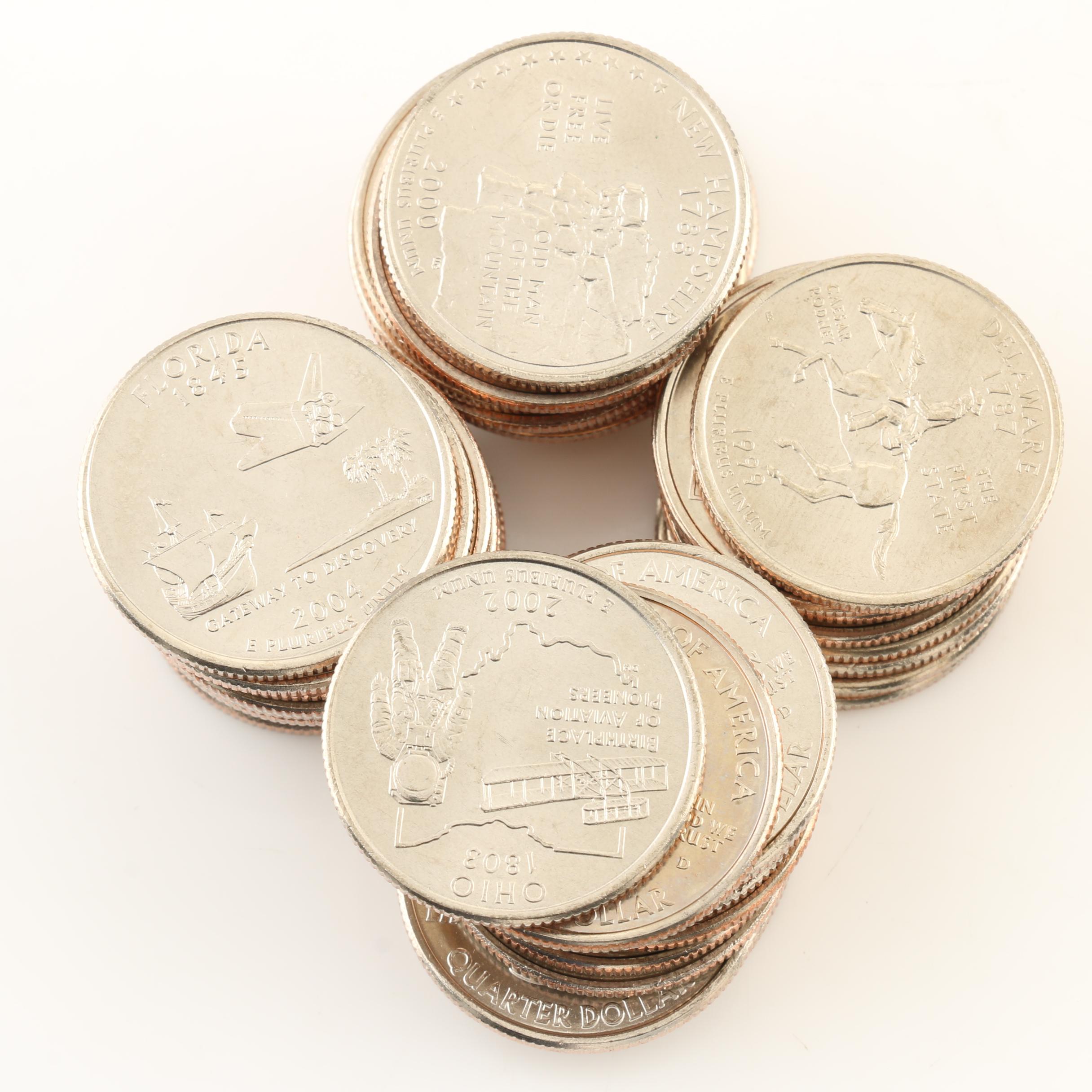 Group of 101 Various U.S. Statehood Quarters and  U.S. Mint State Quarter Folder