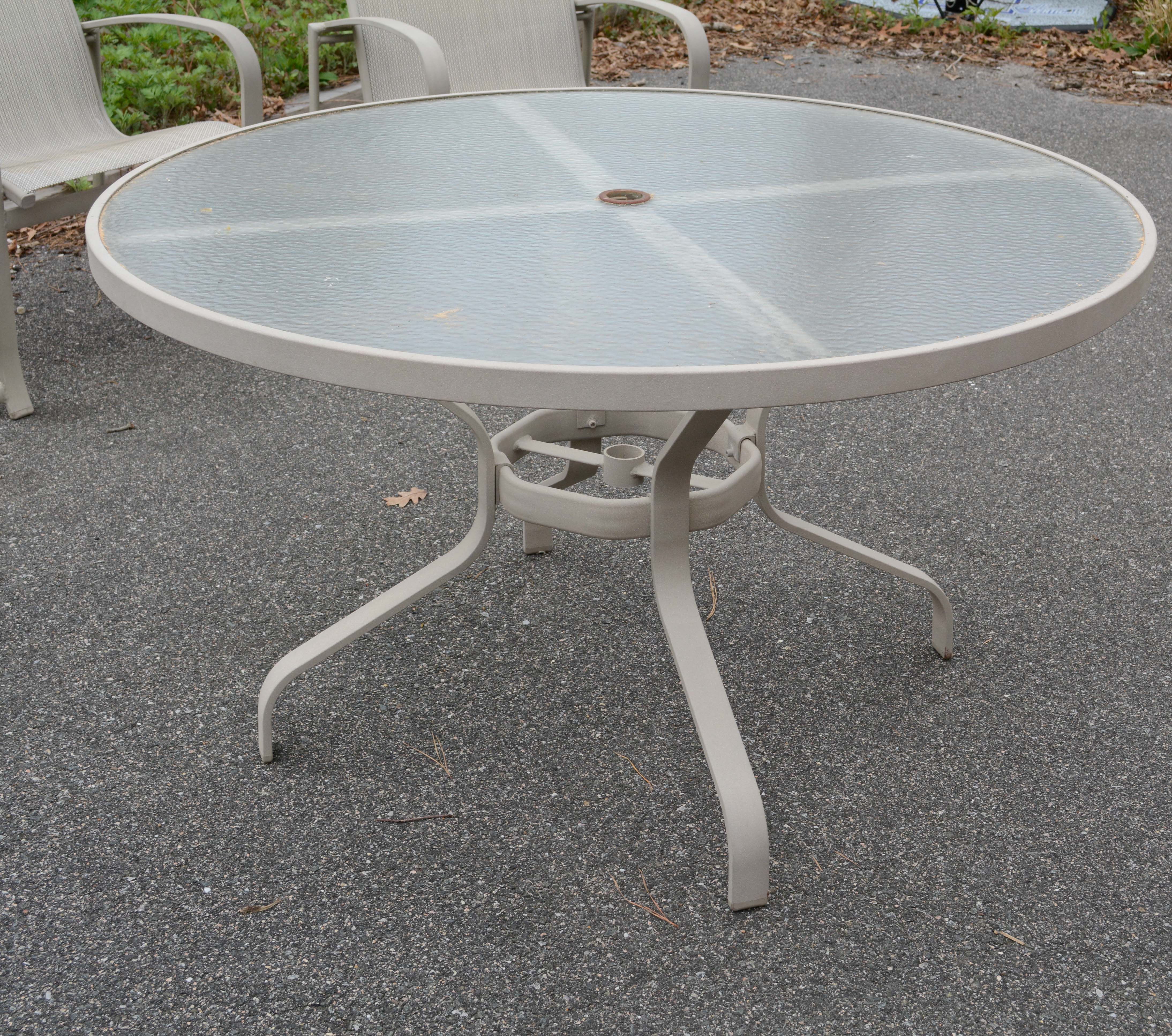 Patio Dining Set with Umbrella by Tropitone