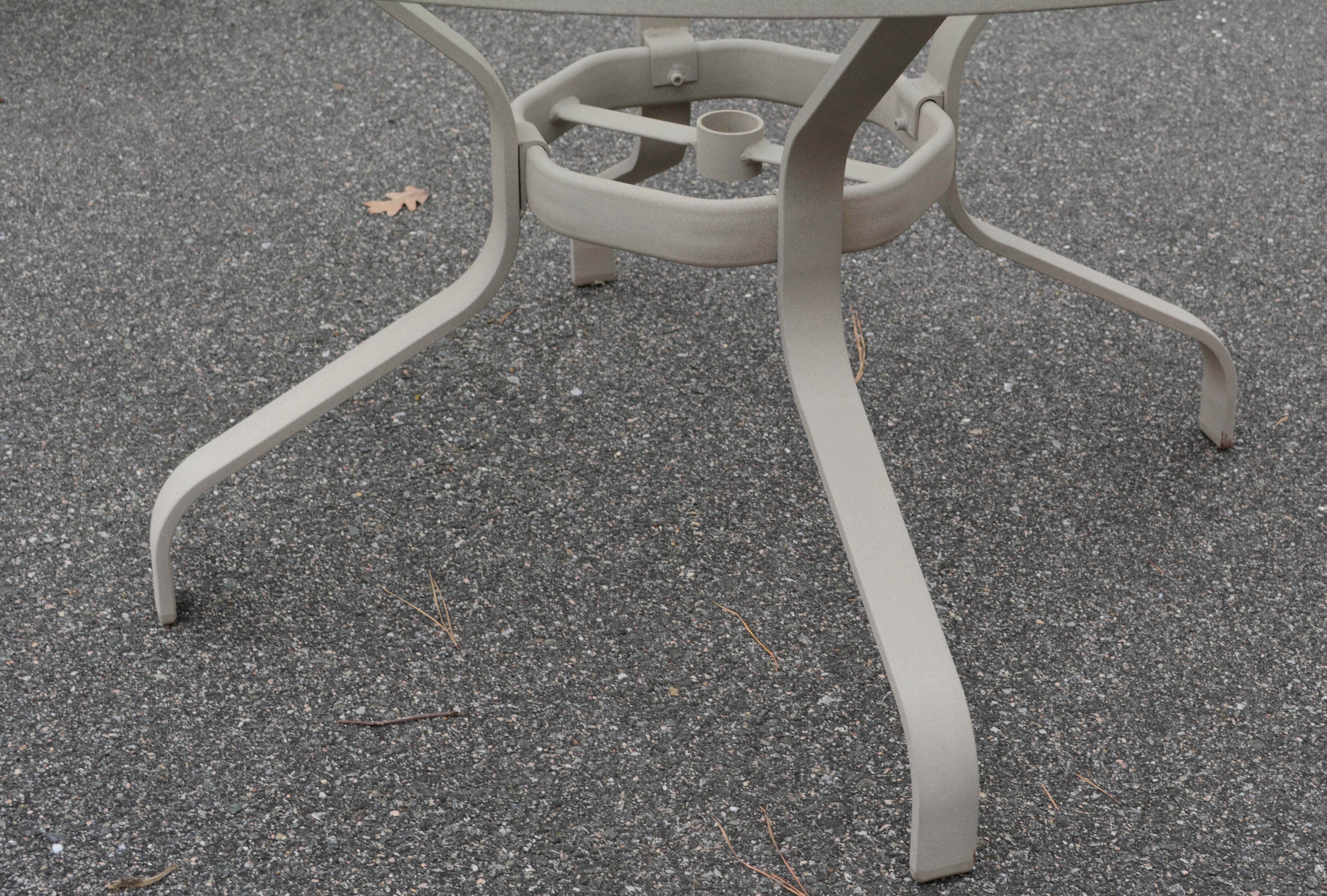 Patio Dining Set with Umbrella by Tropitone