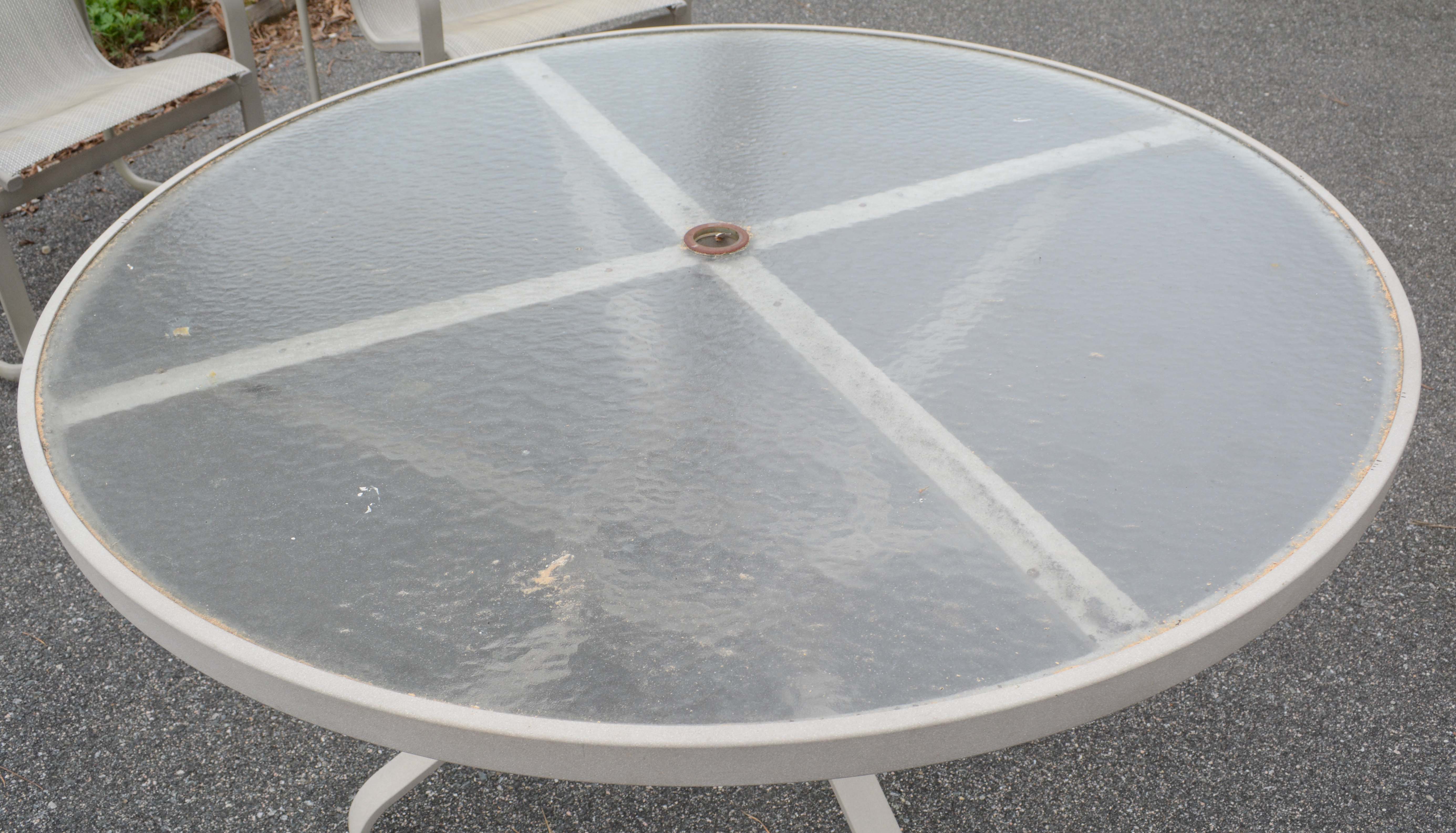 Patio Dining Set with Umbrella by Tropitone