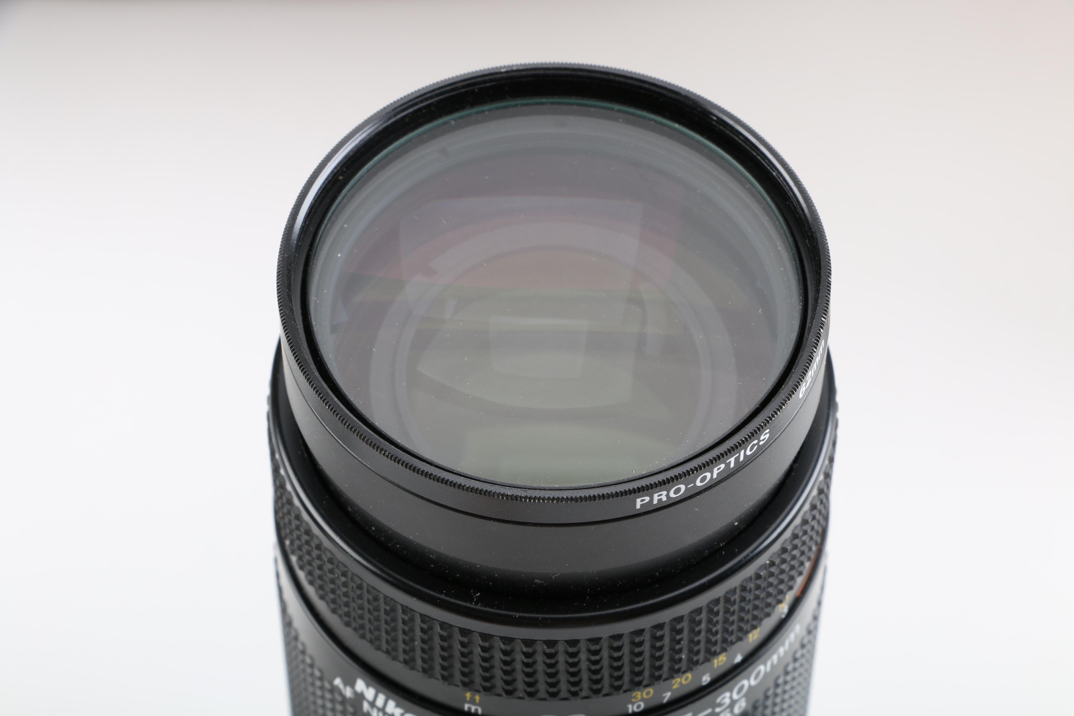 Seikor and Nikon Camera Lenses with D'Brozzi Leather Camera Bag and More