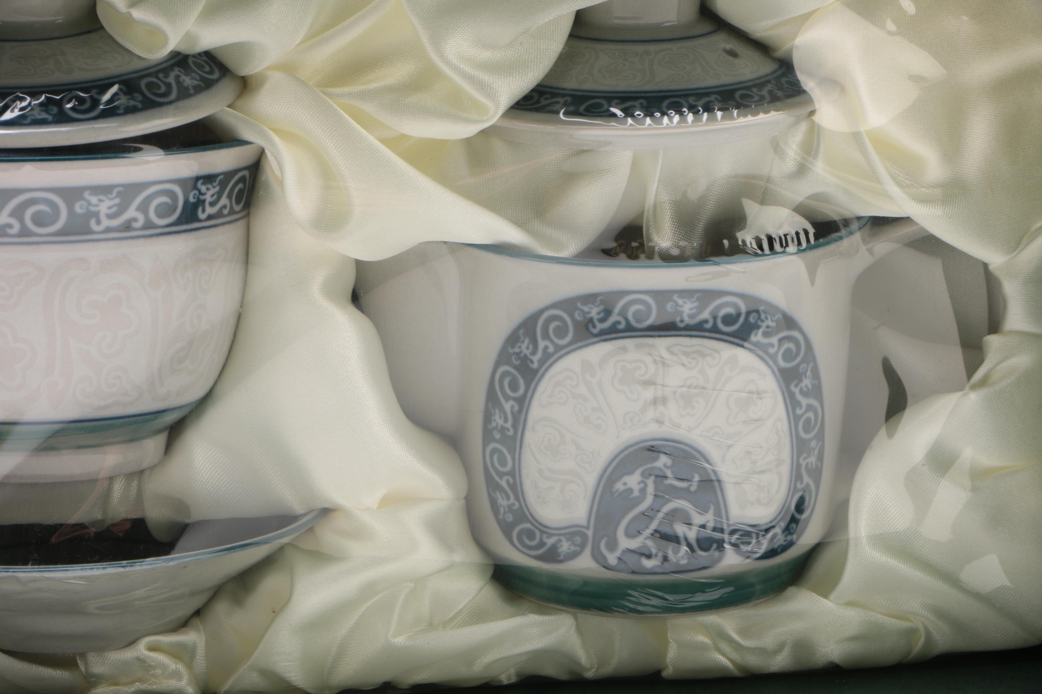 Chinese Porcelain Tea Sets with Fish and Dragon Motifs
