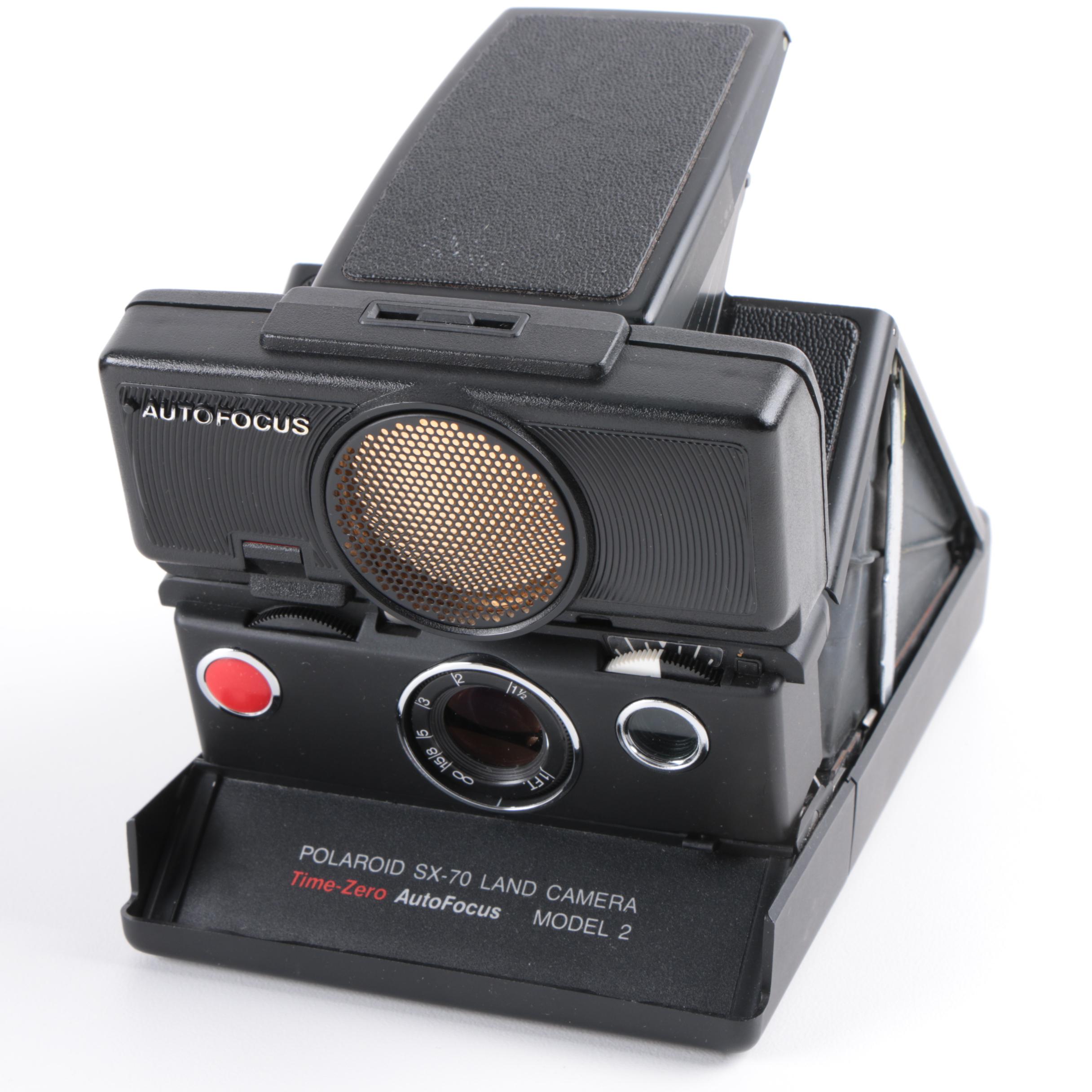 Vintage Polaroid SX-70 Land Camera Model 2 and Nikon Rangefinder Camera