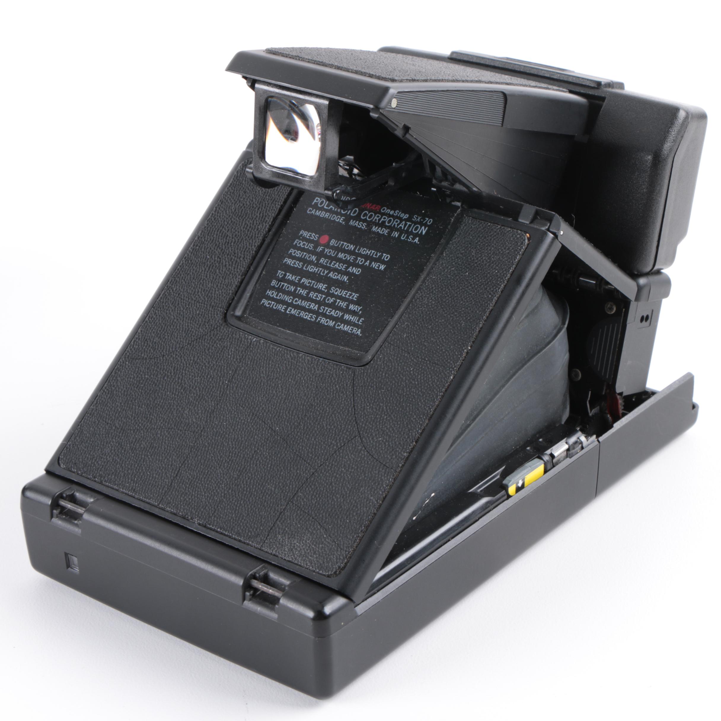 Vintage Polaroid SX-70 Land Camera Model 2 and Nikon Rangefinder Camera