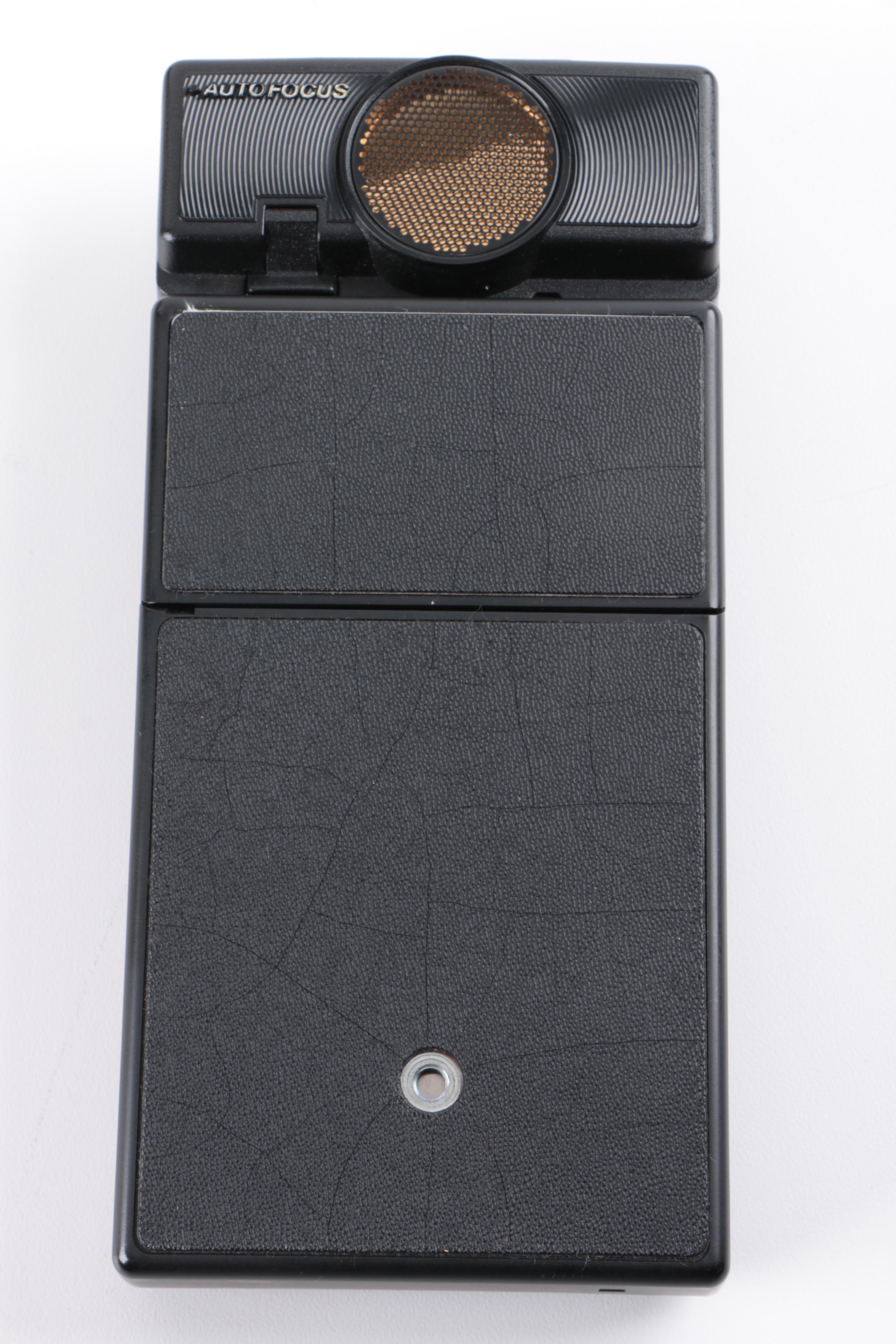 Vintage Polaroid SX-70 Land Camera Model 2 and Nikon Rangefinder Camera