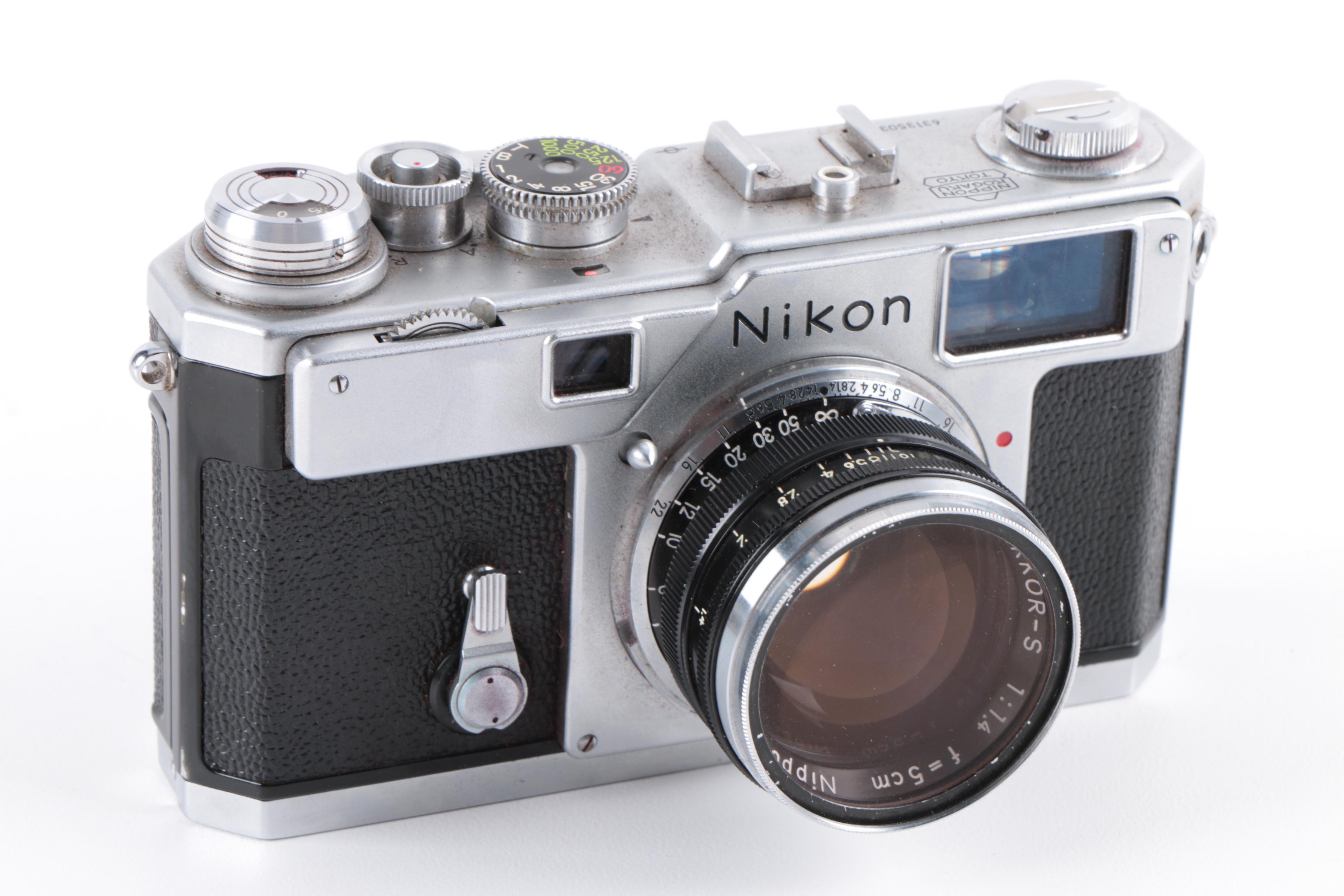 Vintage Polaroid SX-70 Land Camera Model 2 and Nikon Rangefinder Camera