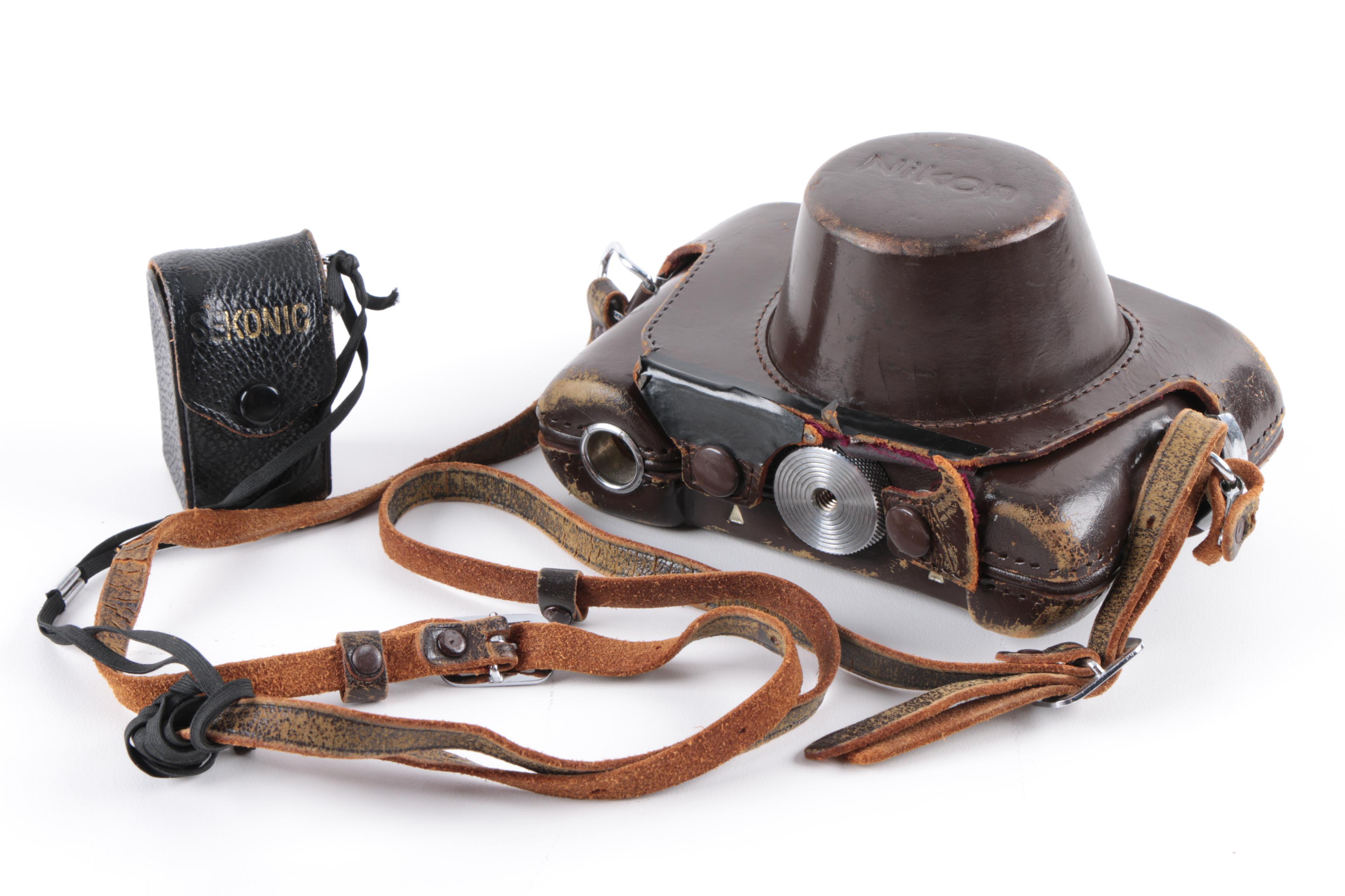 Vintage Polaroid SX-70 Land Camera Model 2 and Nikon Rangefinder Camera