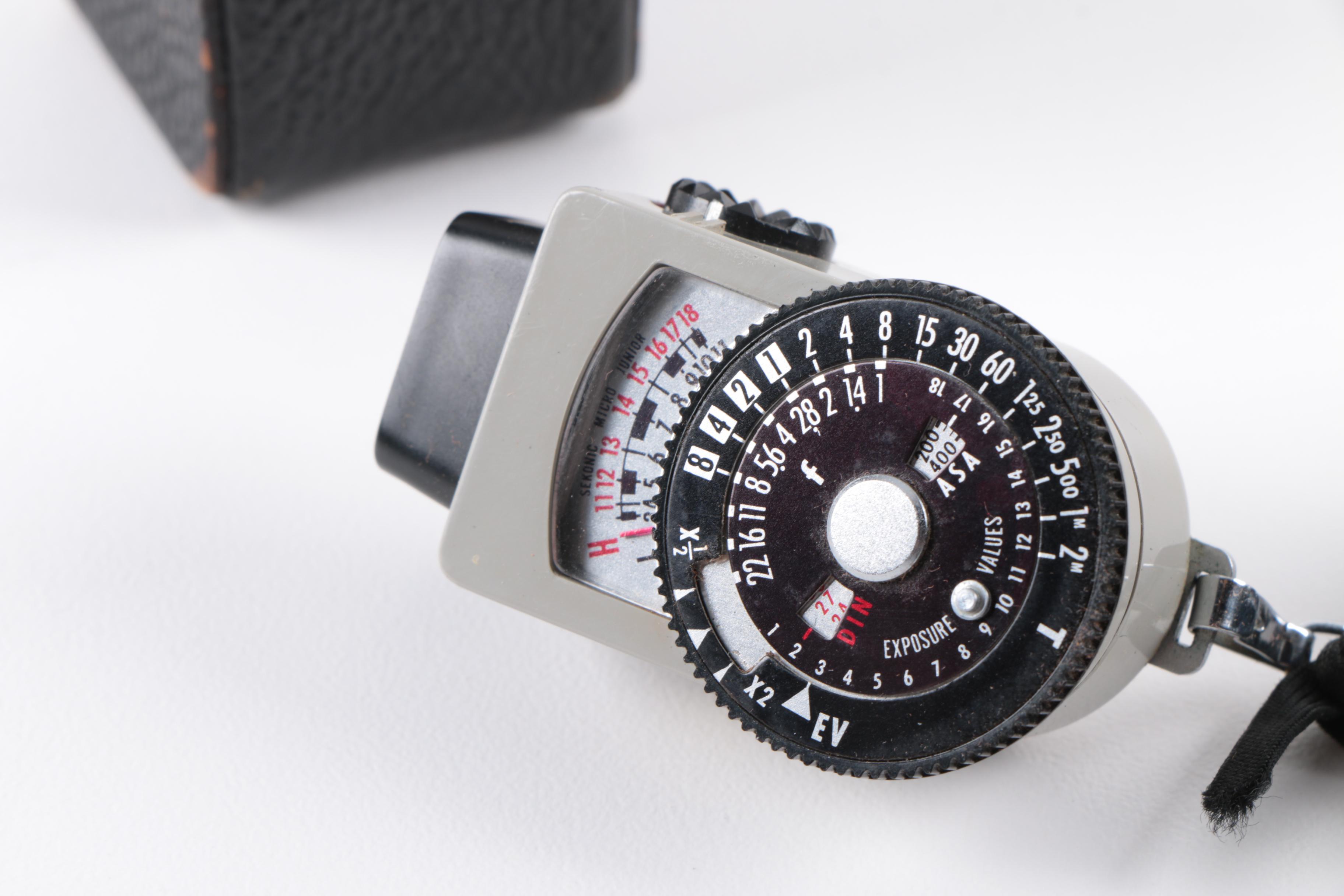 Vintage Polaroid SX-70 Land Camera Model 2 and Nikon Rangefinder Camera