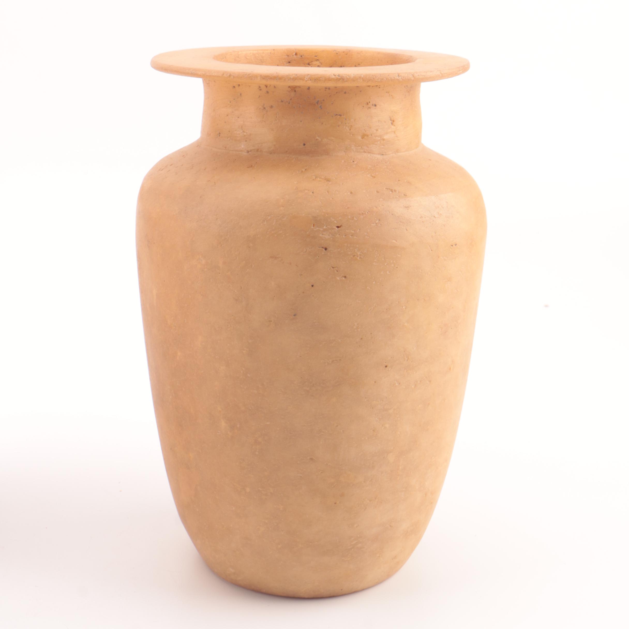 Carved Alabaster Vases and a Resin Candlestick Holder