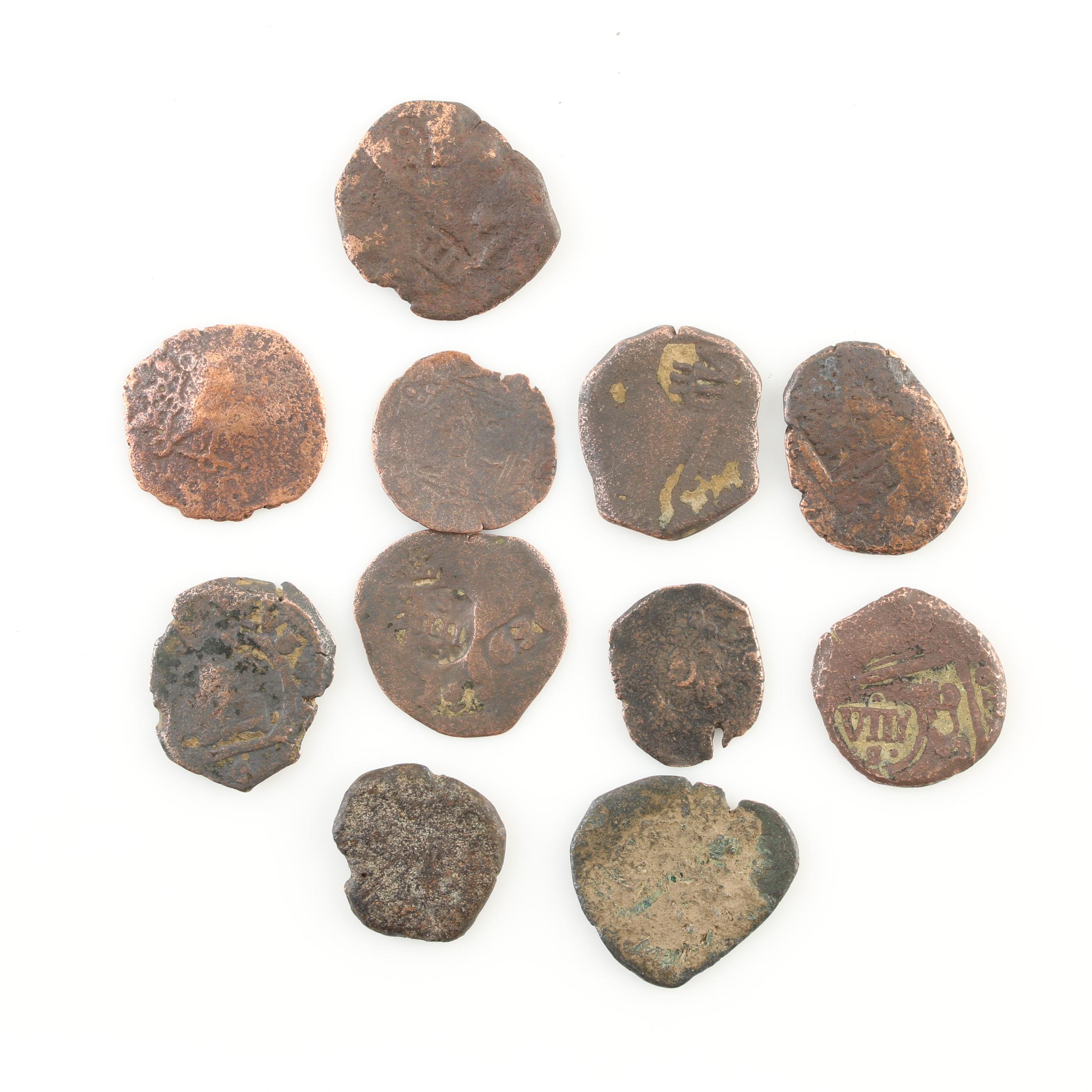 Eleven Spanish Treasure New World Era Bronze Coins
