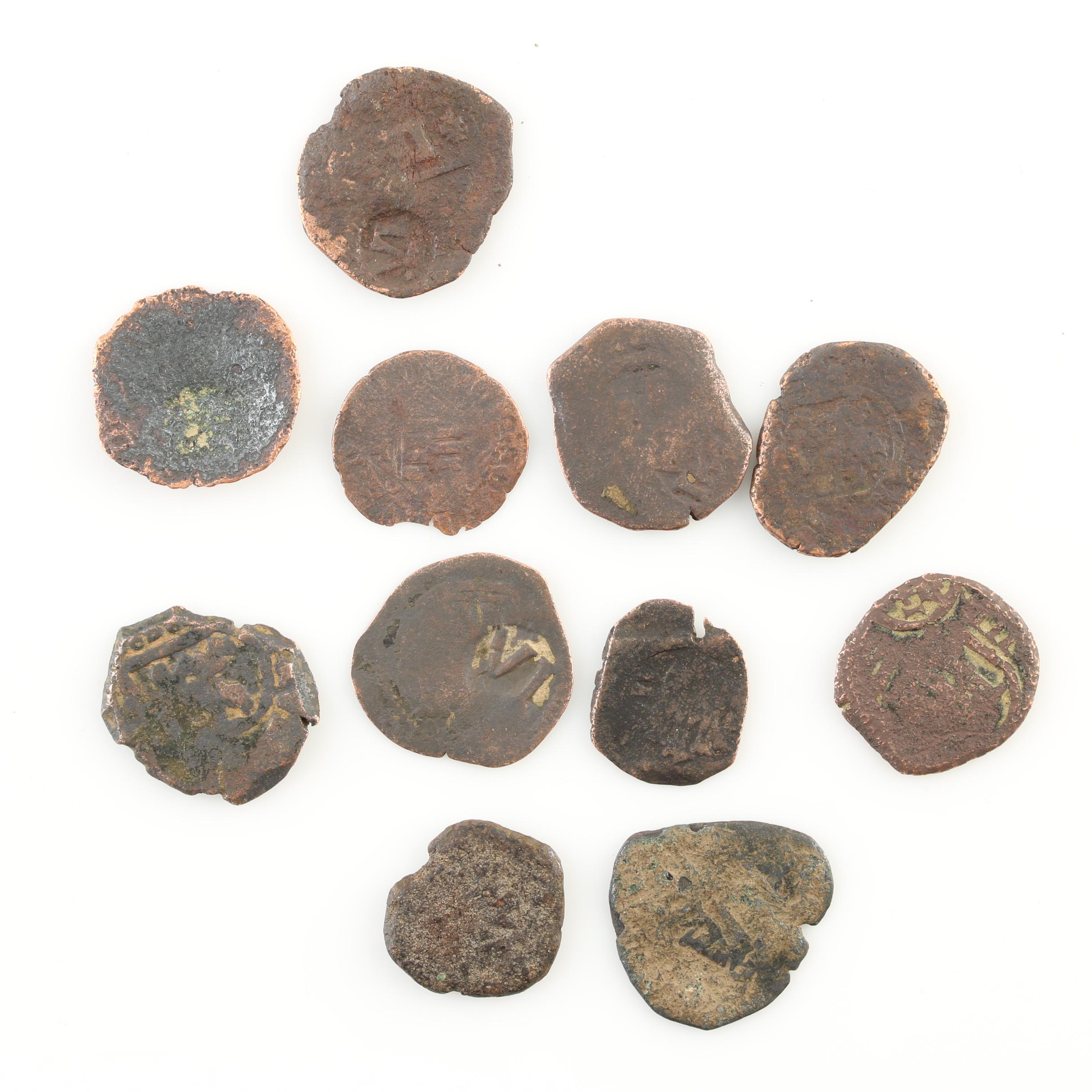 Eleven Spanish Treasure New World Era Bronze Coins