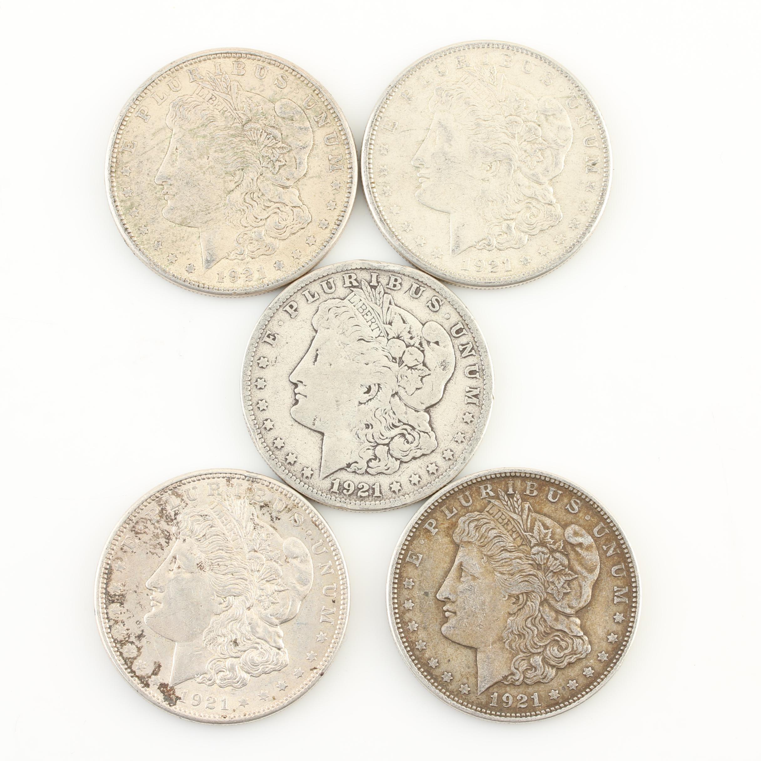Five Morgan Silver Dollars