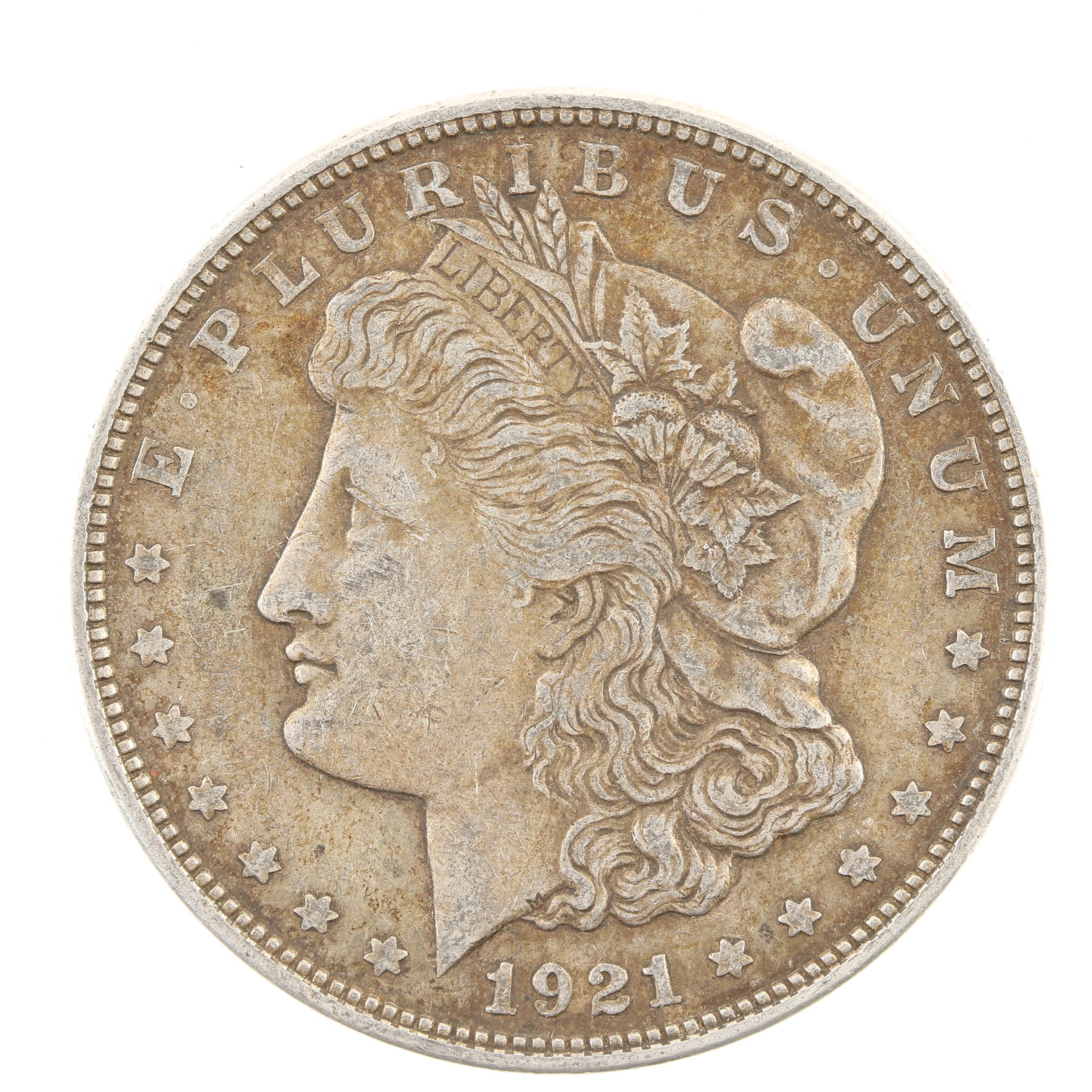 Five Morgan Silver Dollars