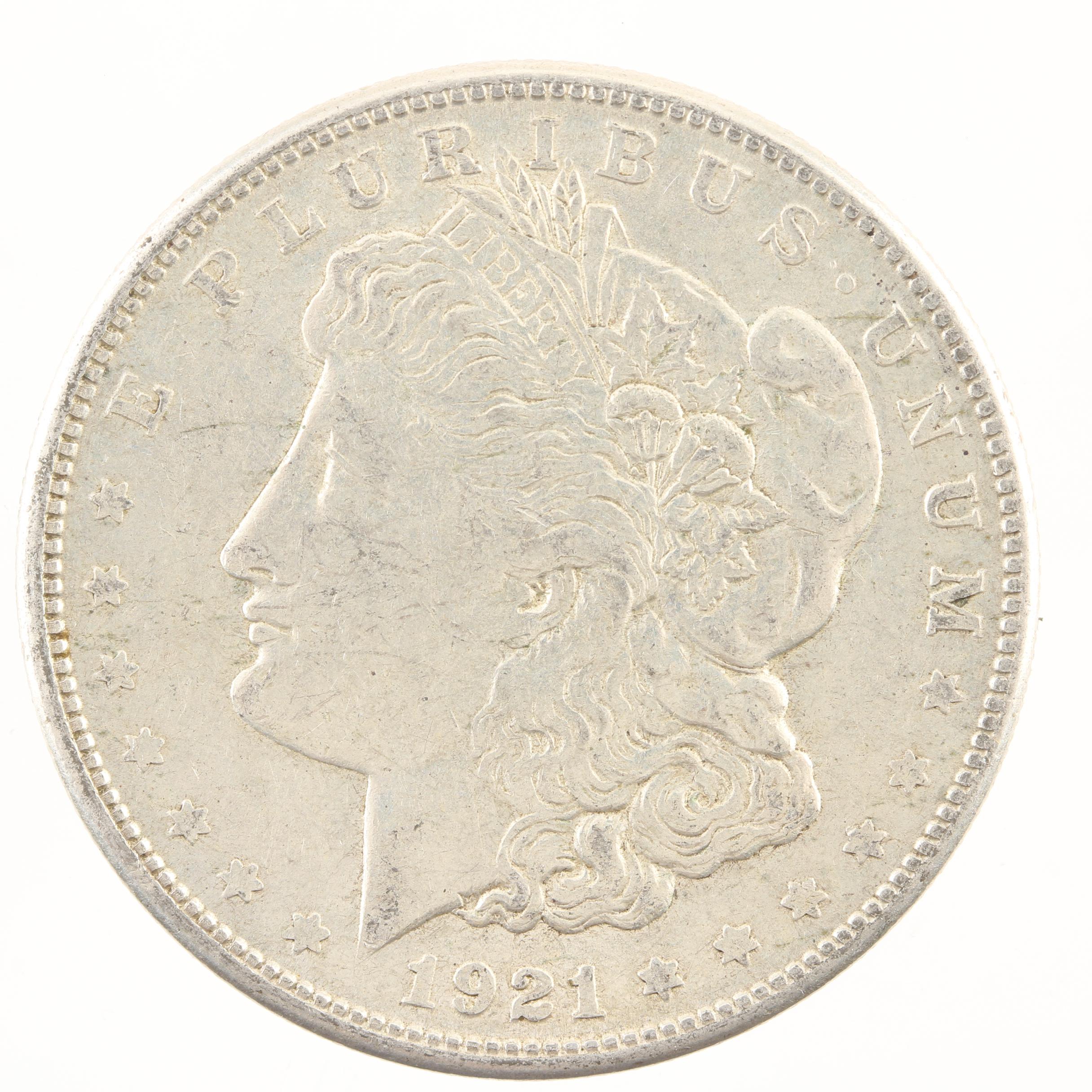 Five Morgan Silver Dollars