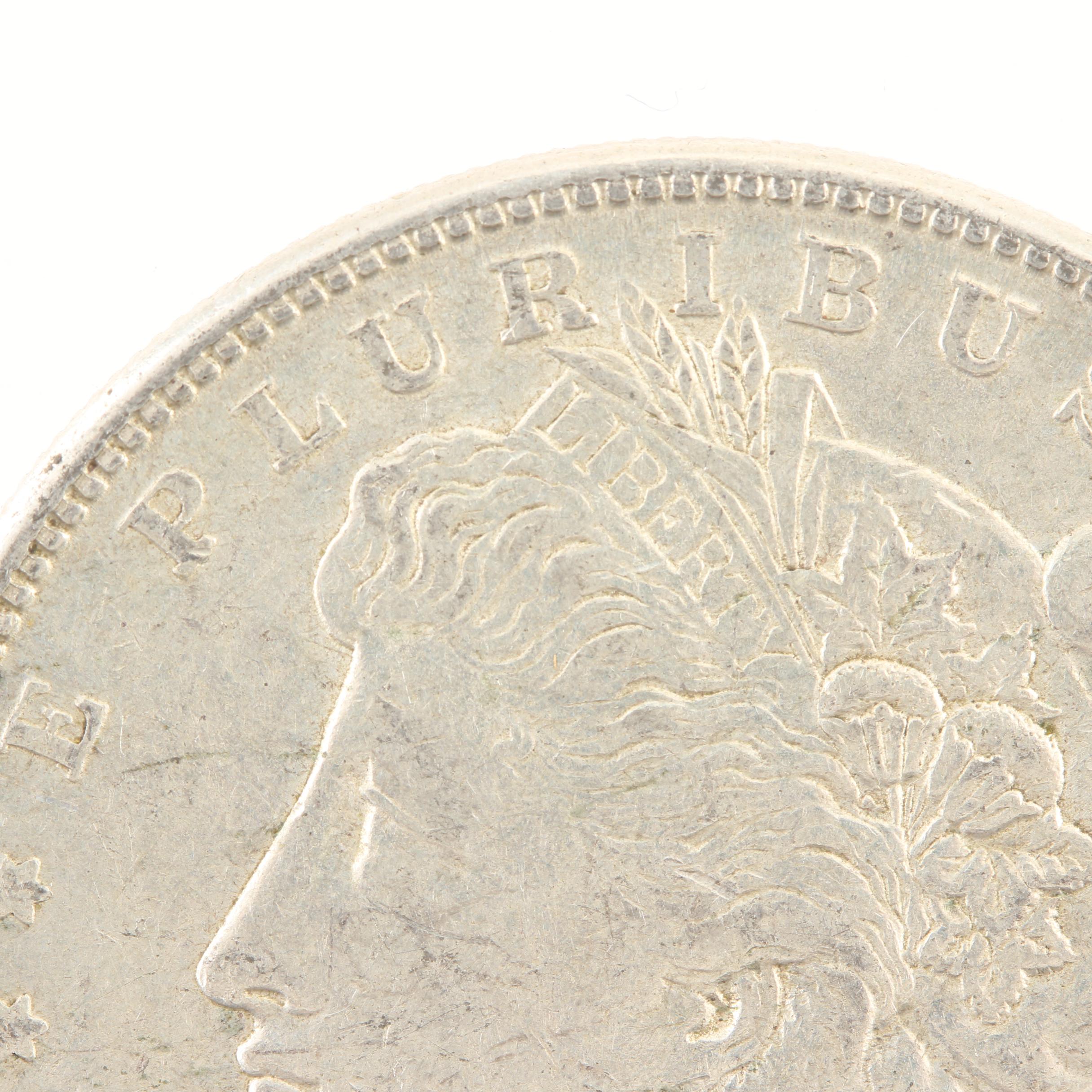 Five Morgan Silver Dollars