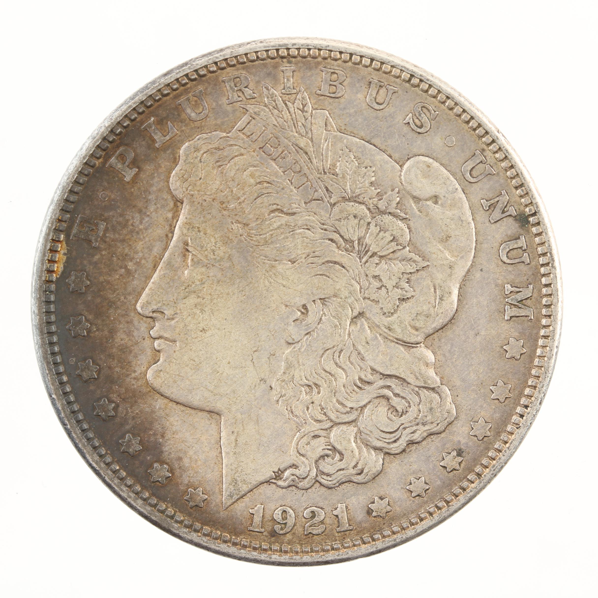 Five Morgan Silver Dollars