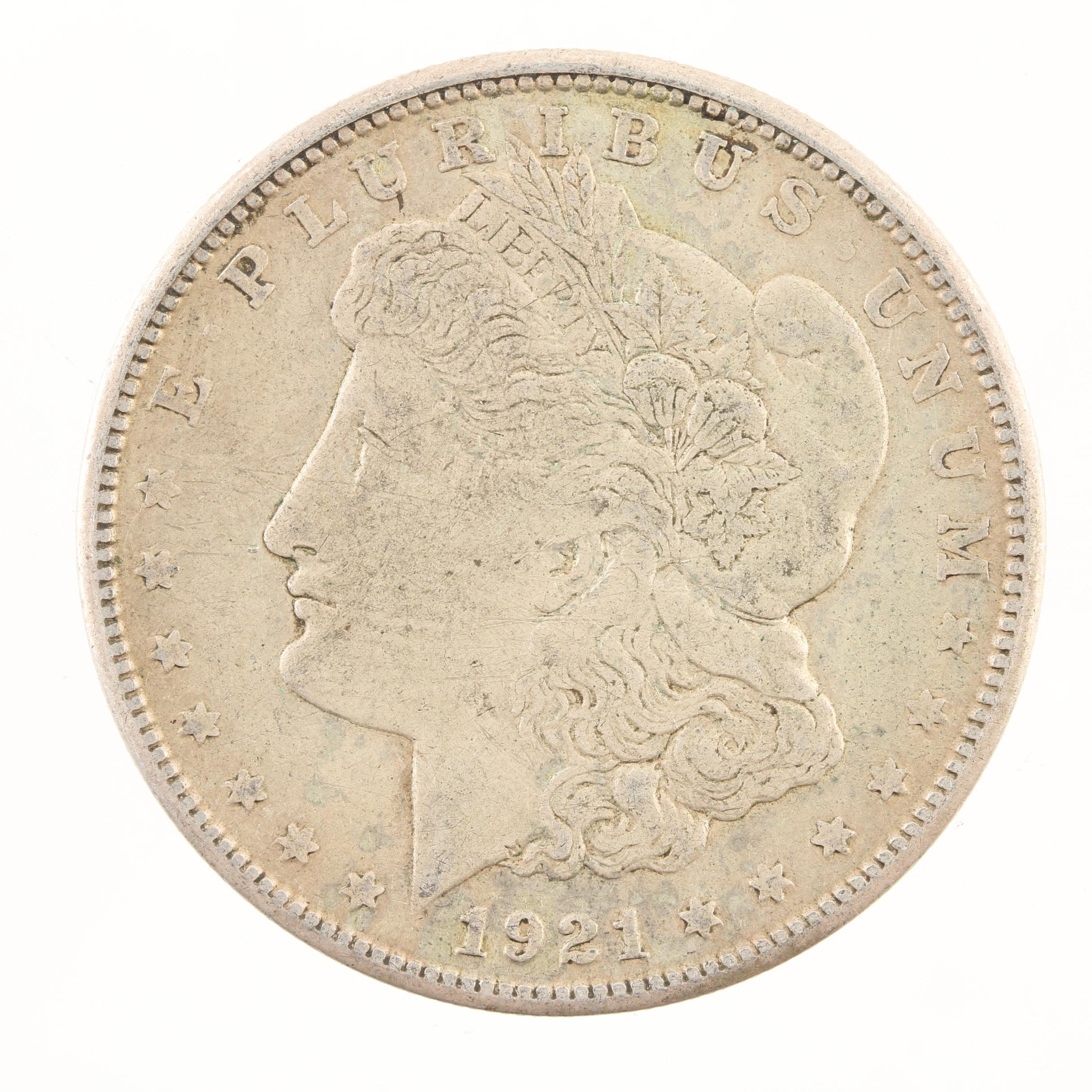 Five Morgan Silver Dollars