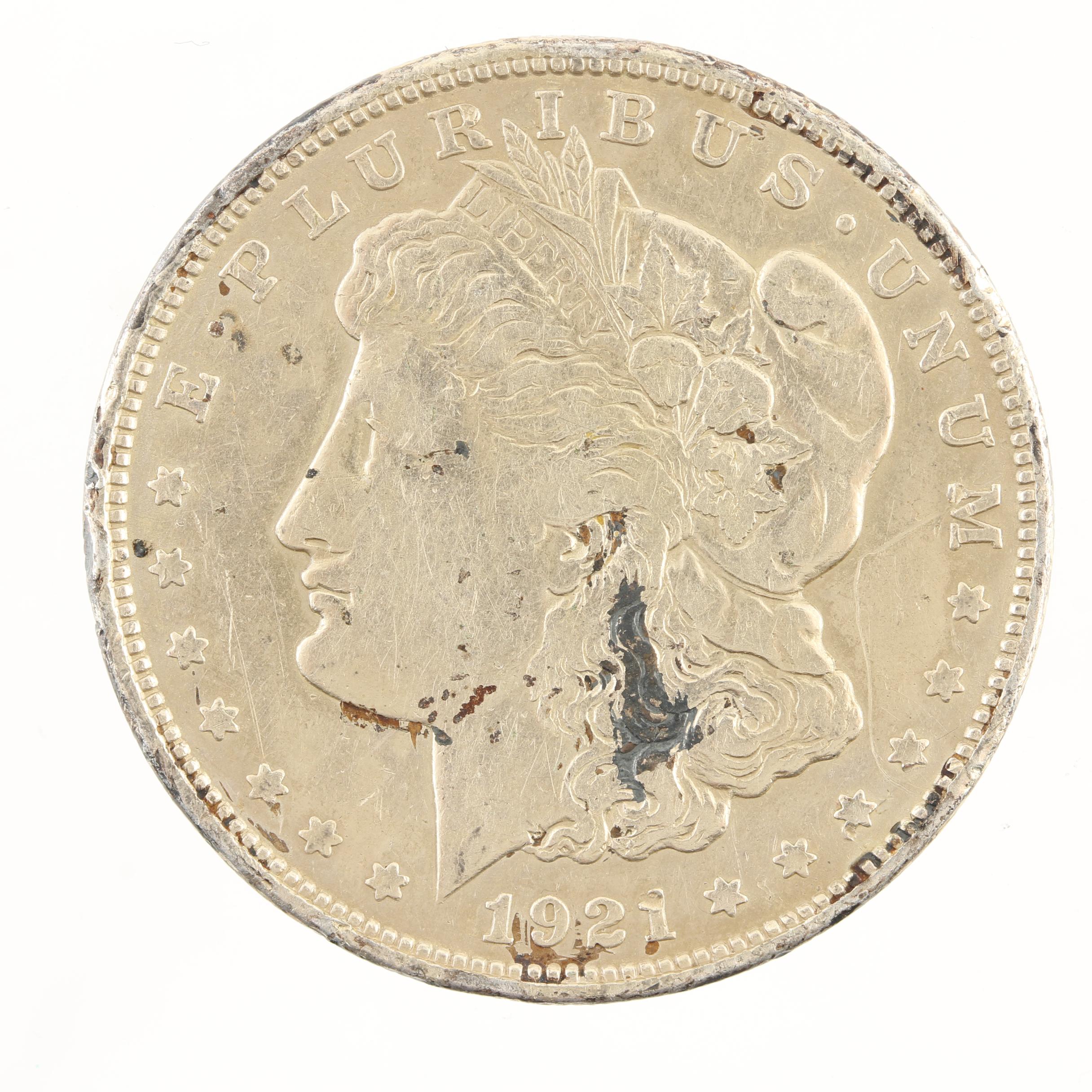 Five Morgan Silver Dollars