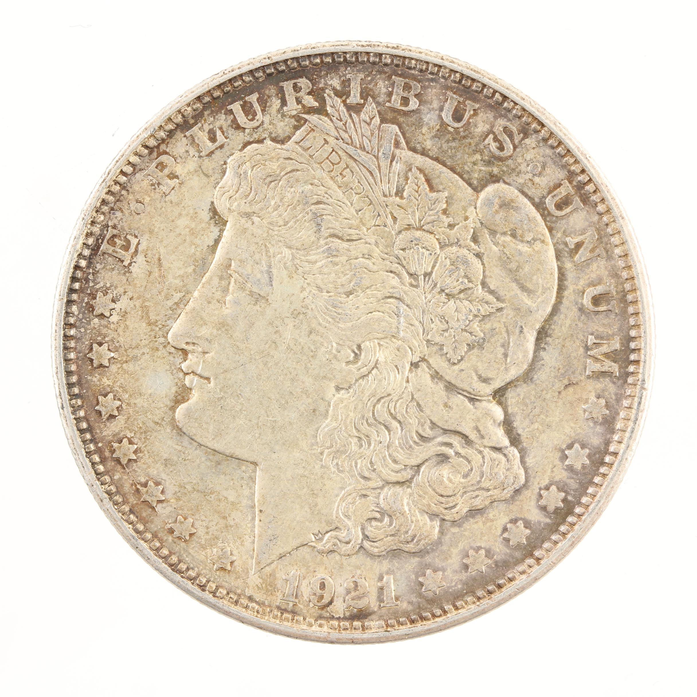 Five Morgan Silver Dollars