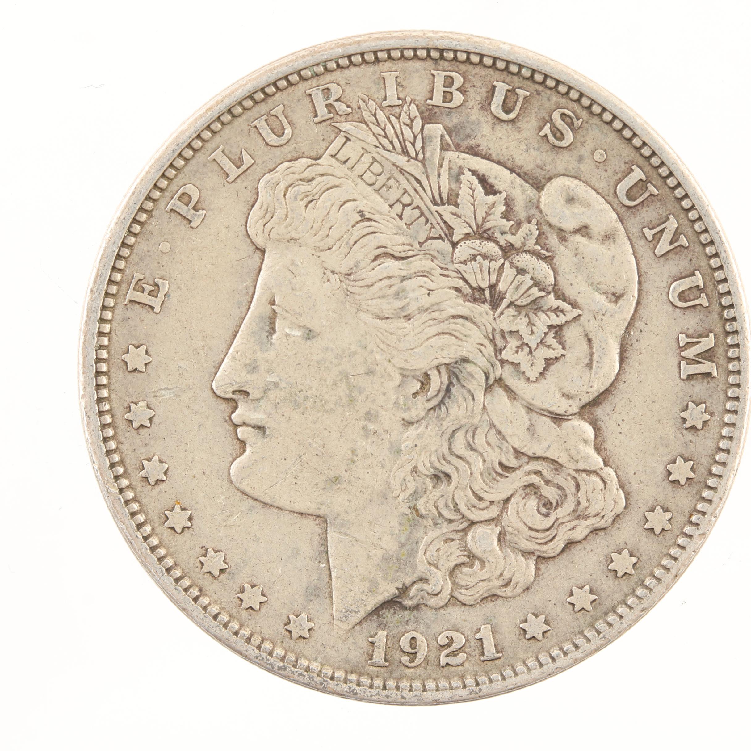 Five Morgan Silver Dollars