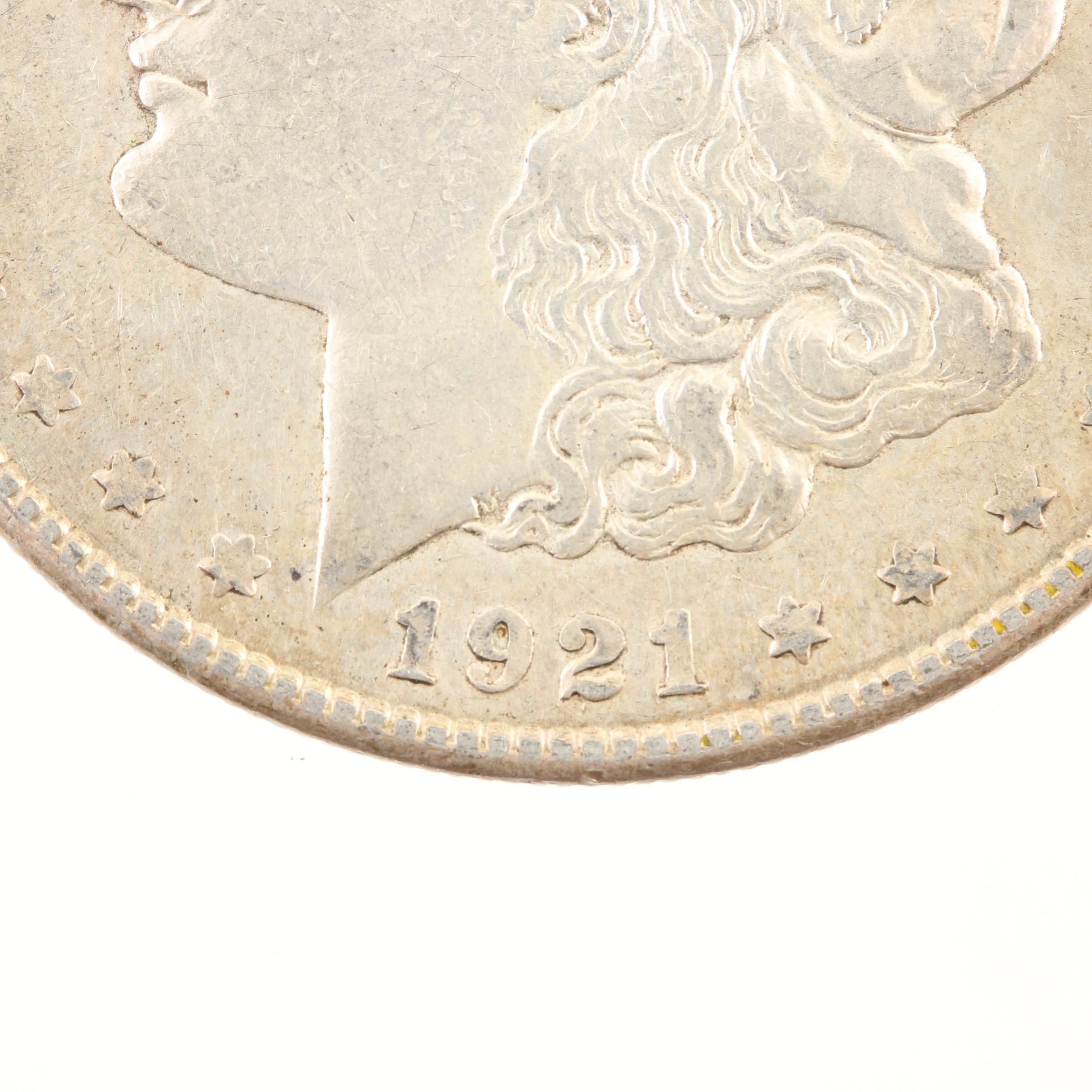 Five Morgan Silver Dollars