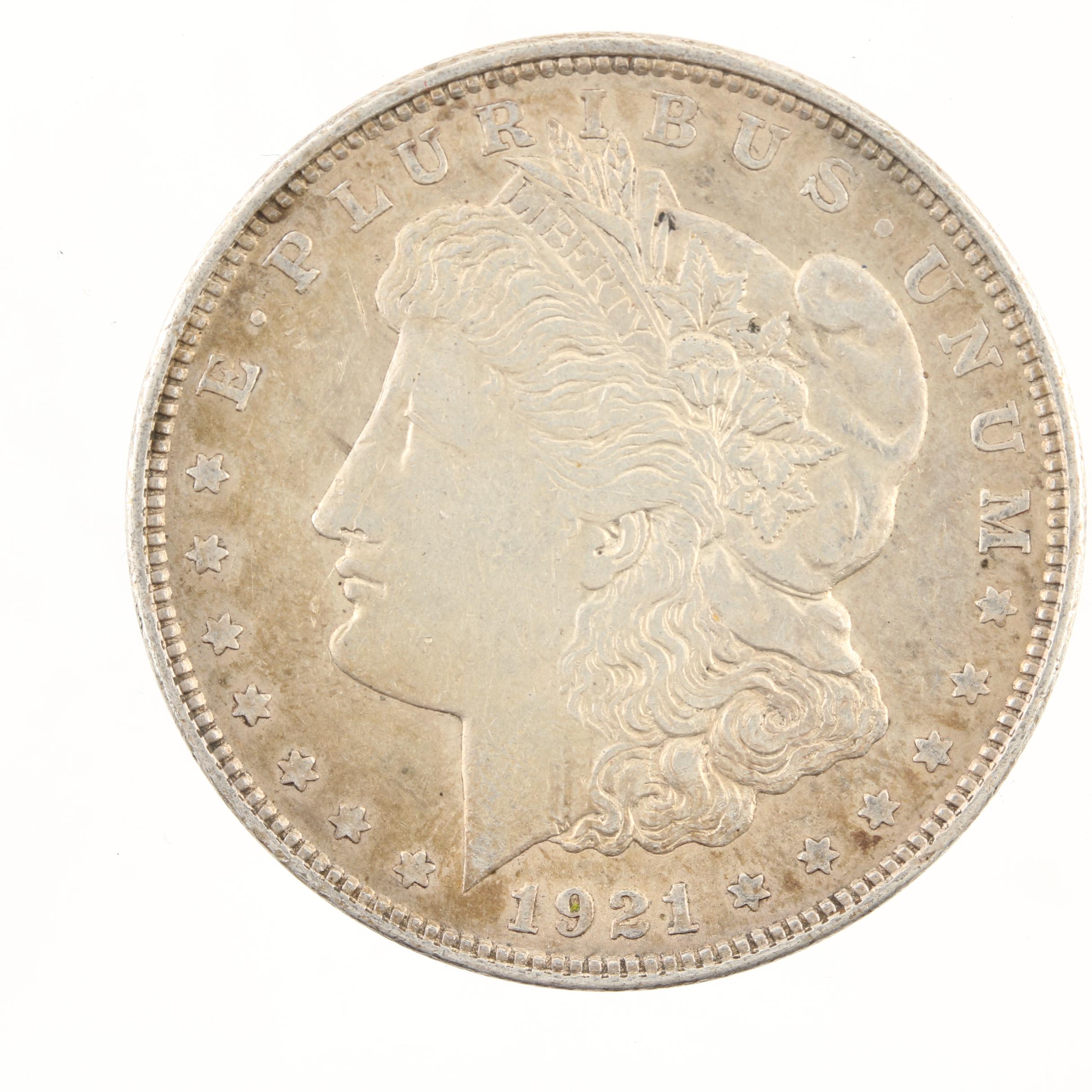 Five Morgan Silver Dollars