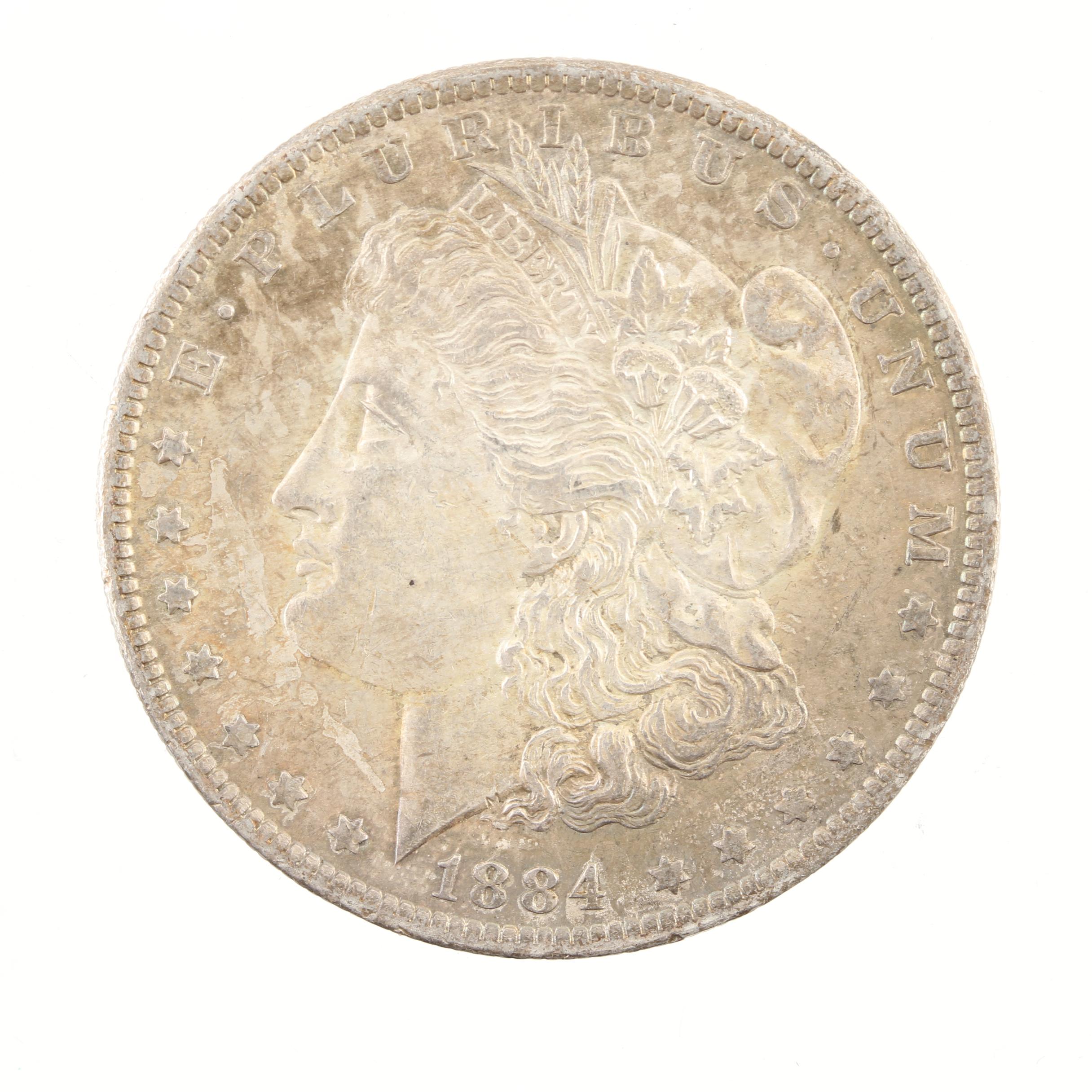 Five Morgan Silver Dollars