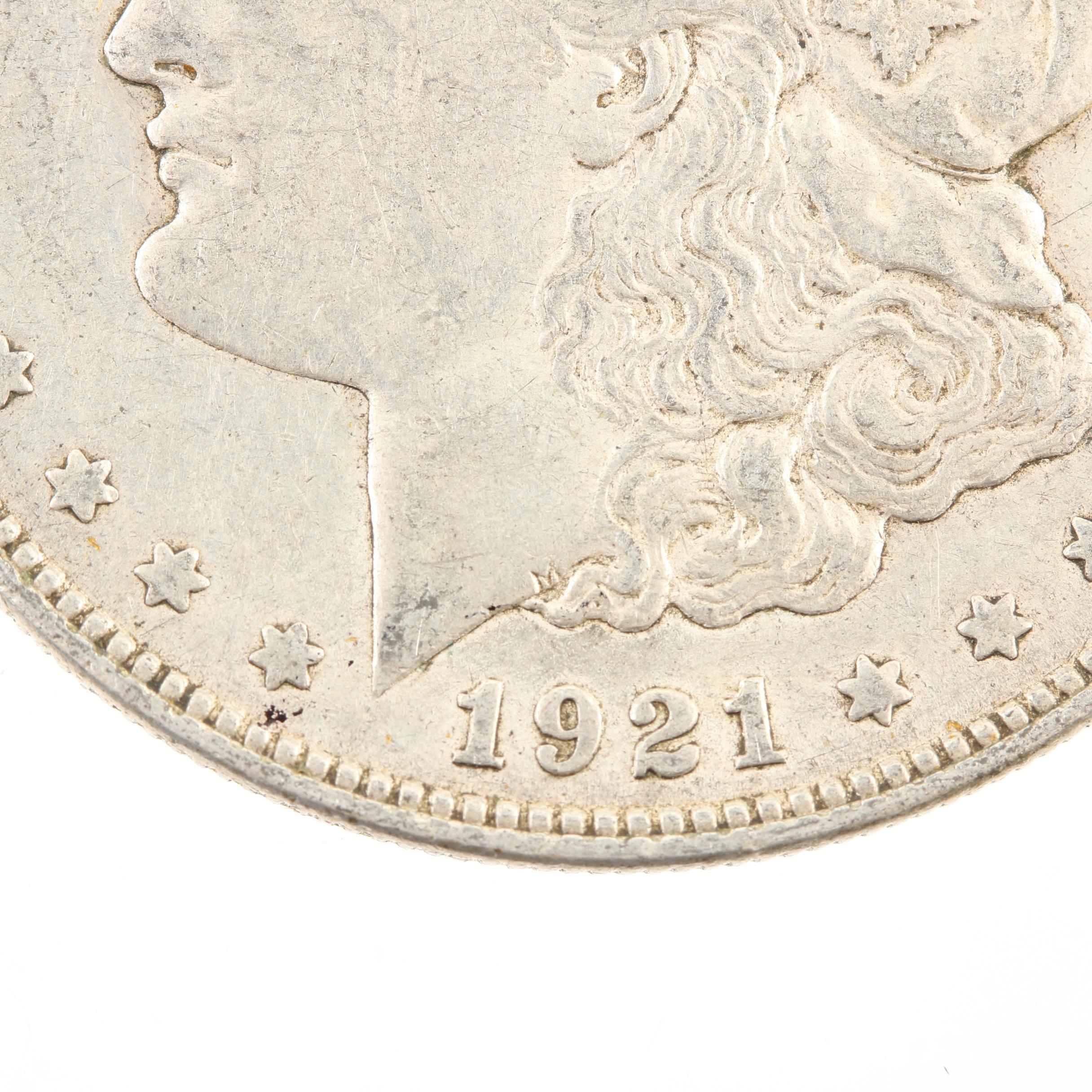 Five Morgan Silver Dollars