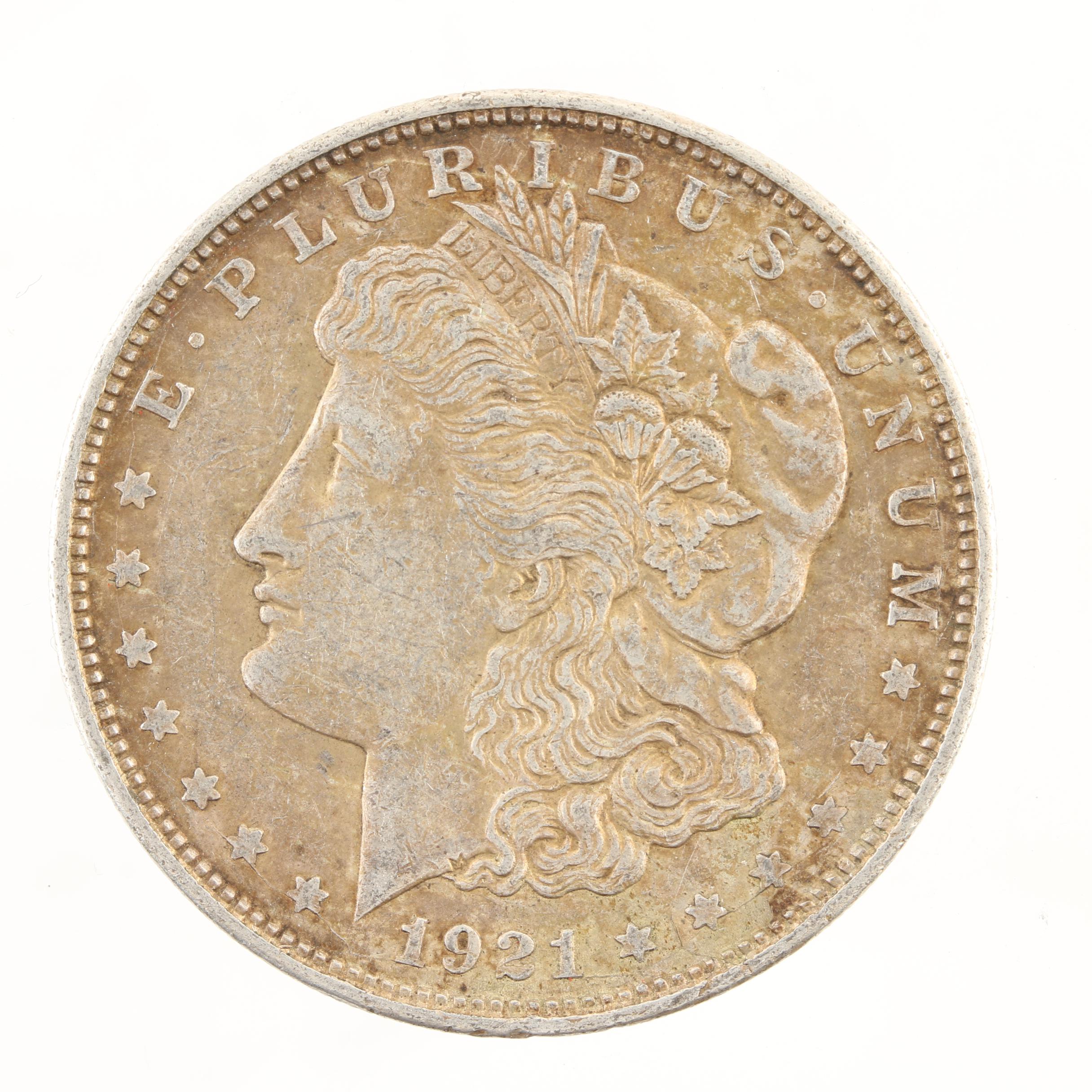 Five Morgan Silver Dollars