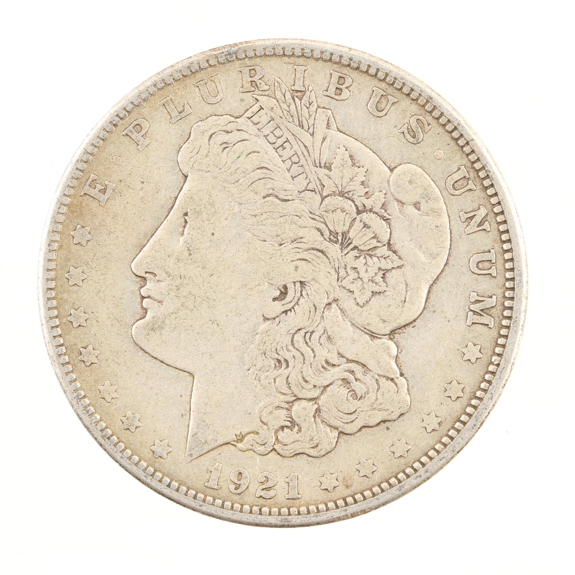 Five Morgan Silver Dollars