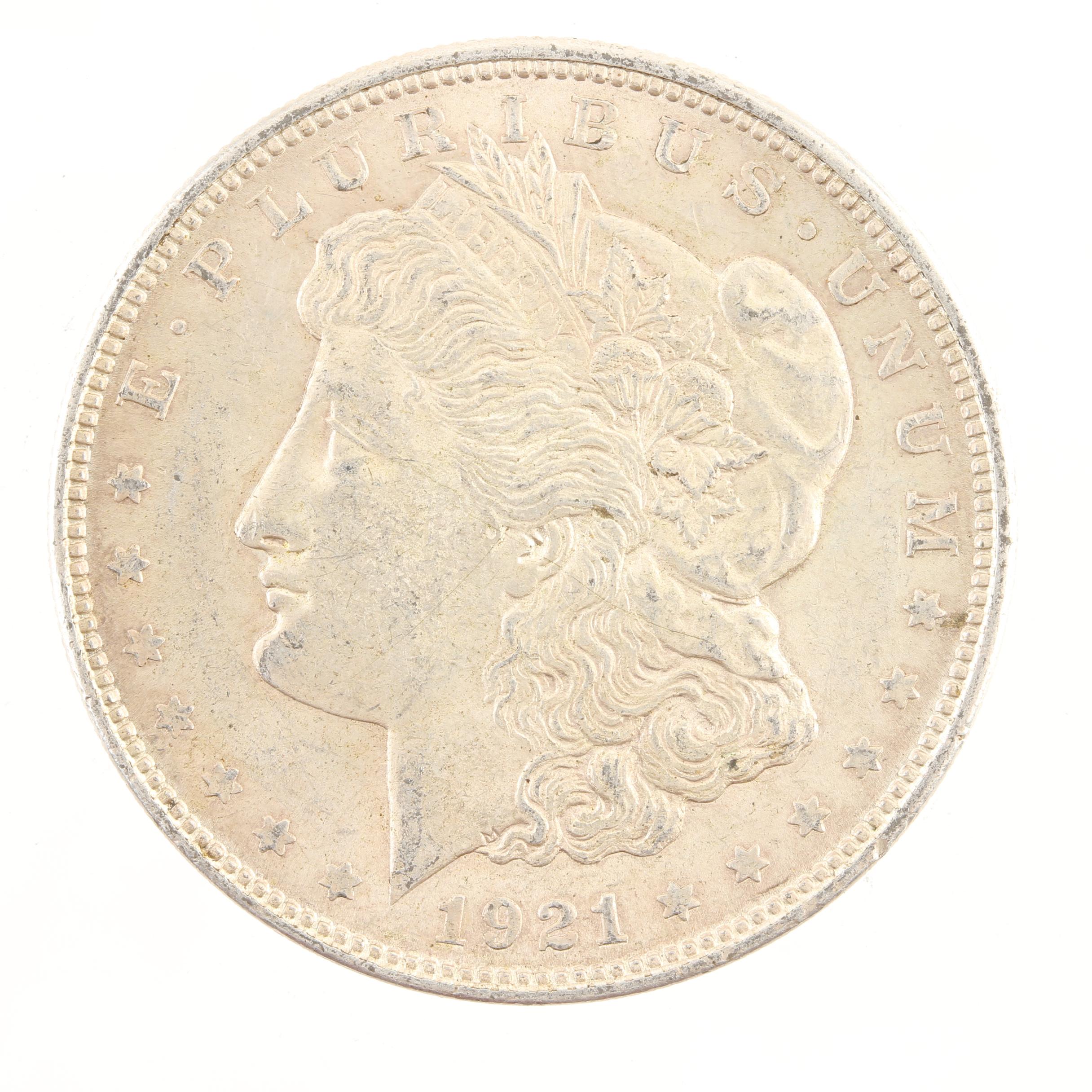 Five Morgan Silver Dollars