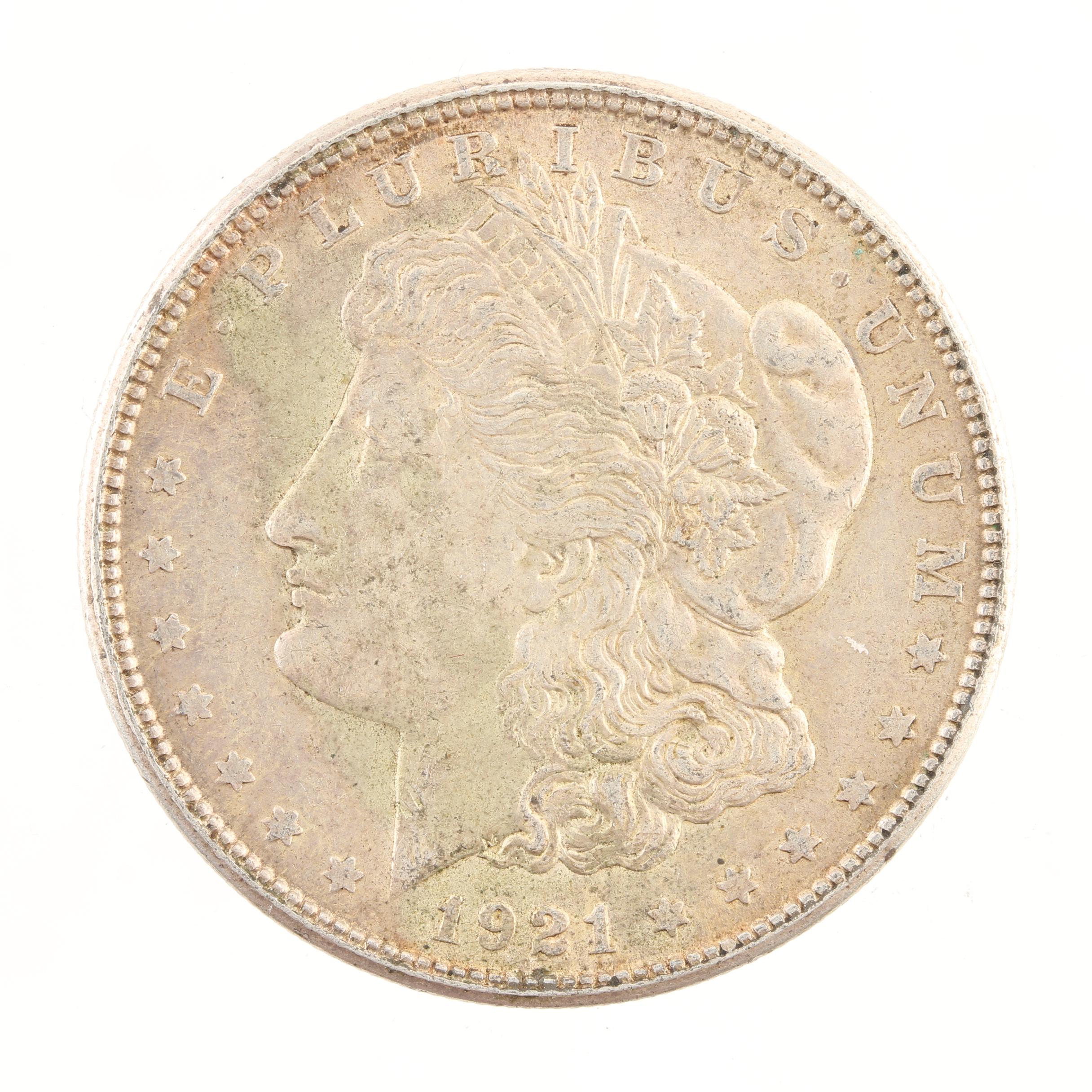 Five Morgan Silver Dollars