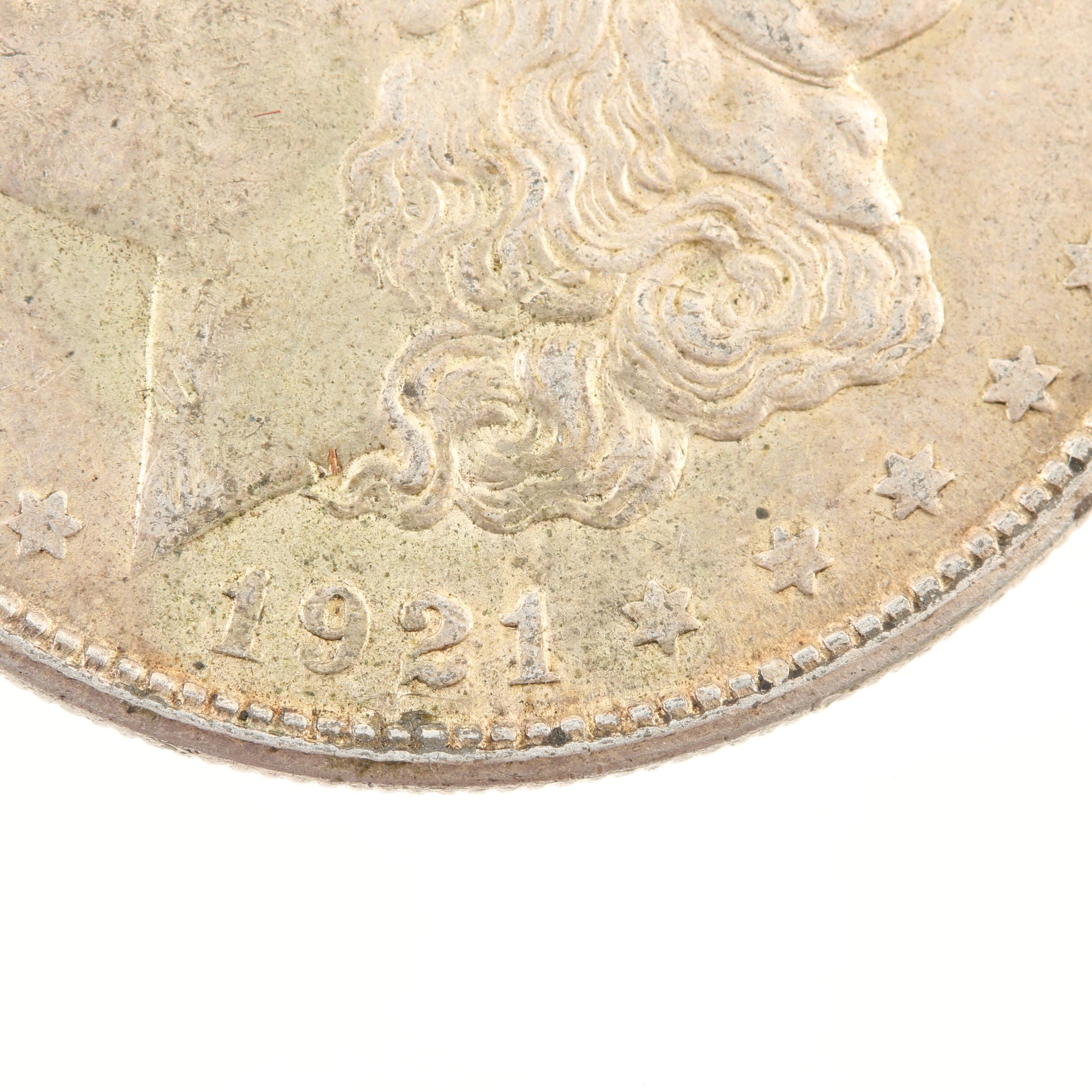 Five Morgan Silver Dollars