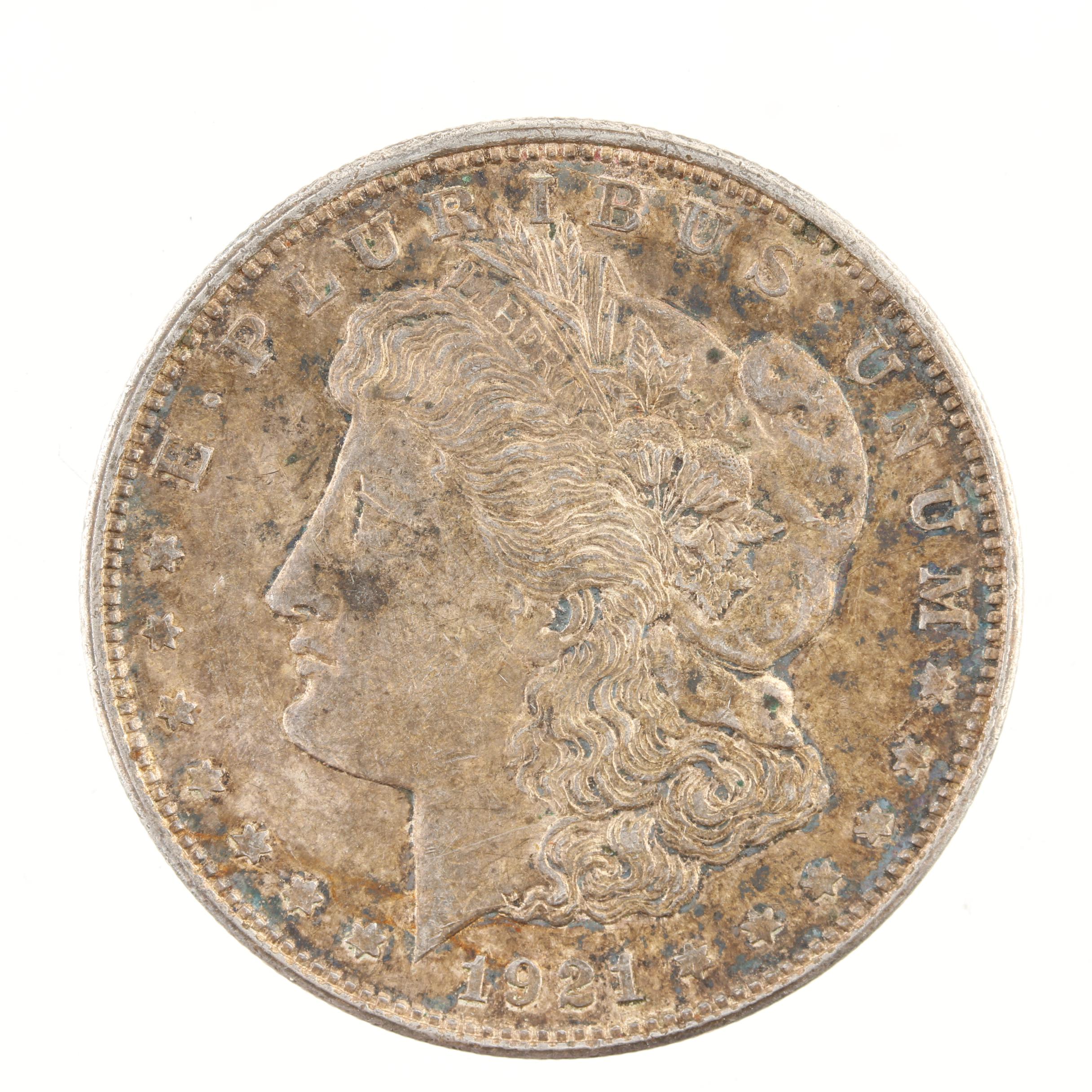 Five Morgan Silver Dollars