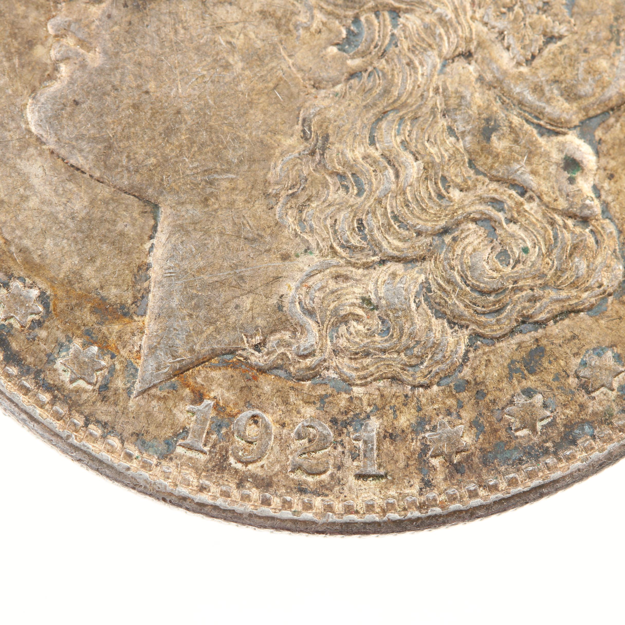 Five Morgan Silver Dollars