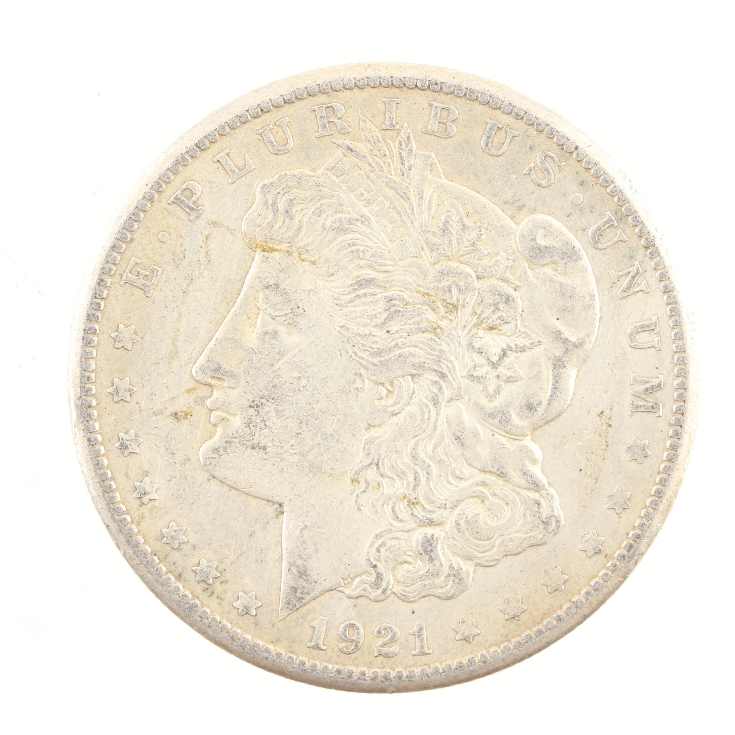 Five Morgan Silver Dollars