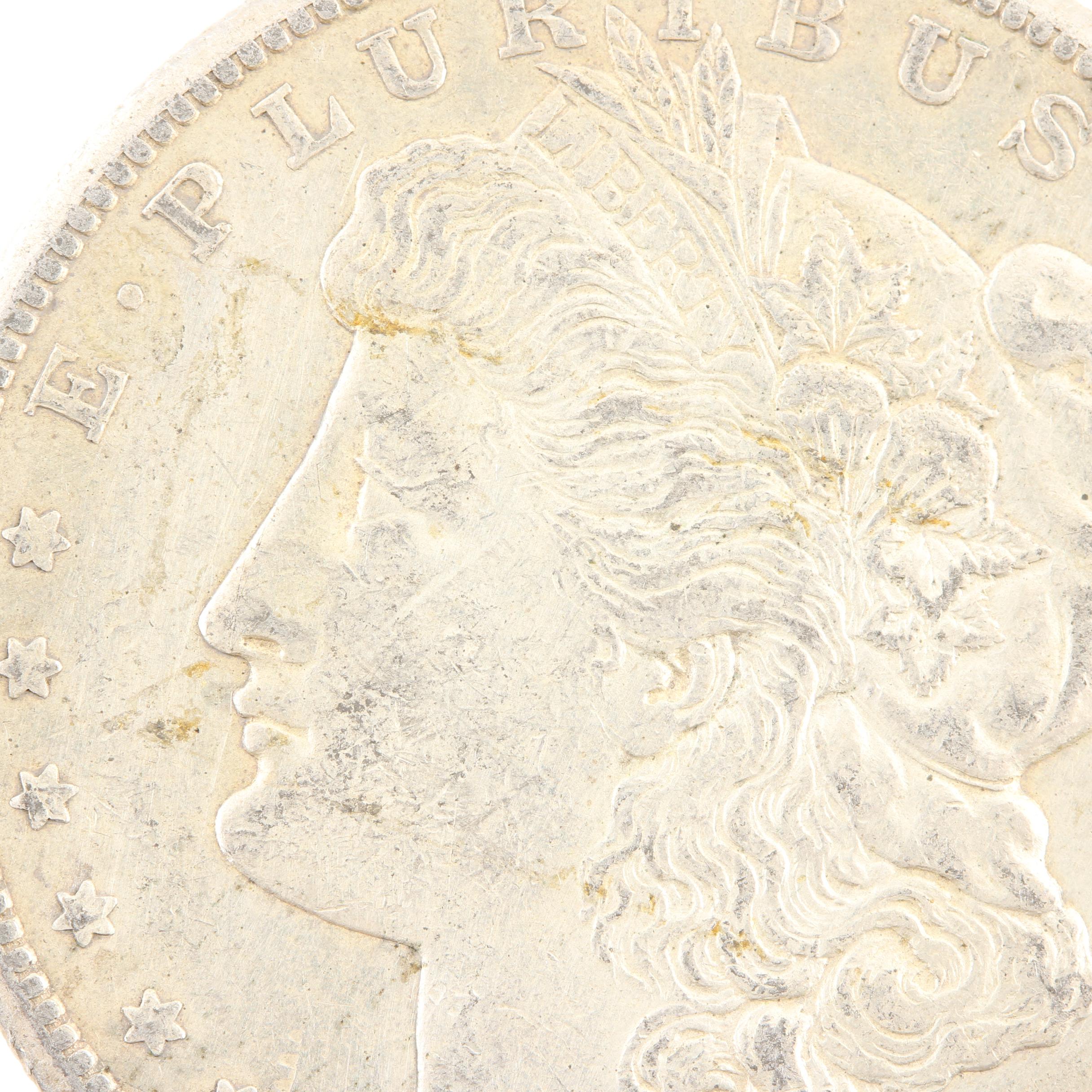 Five Morgan Silver Dollars