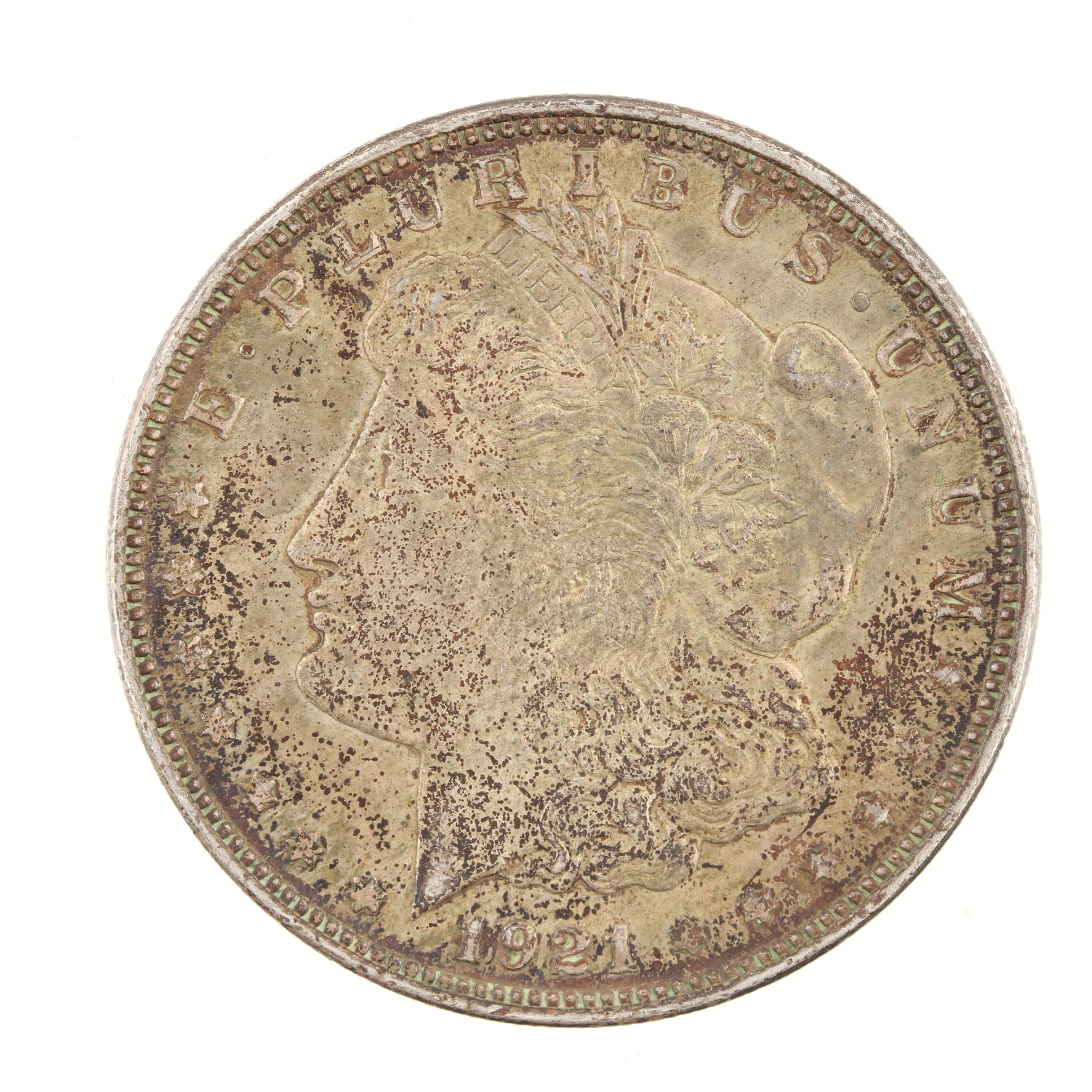 Five Morgan Silver Dollars