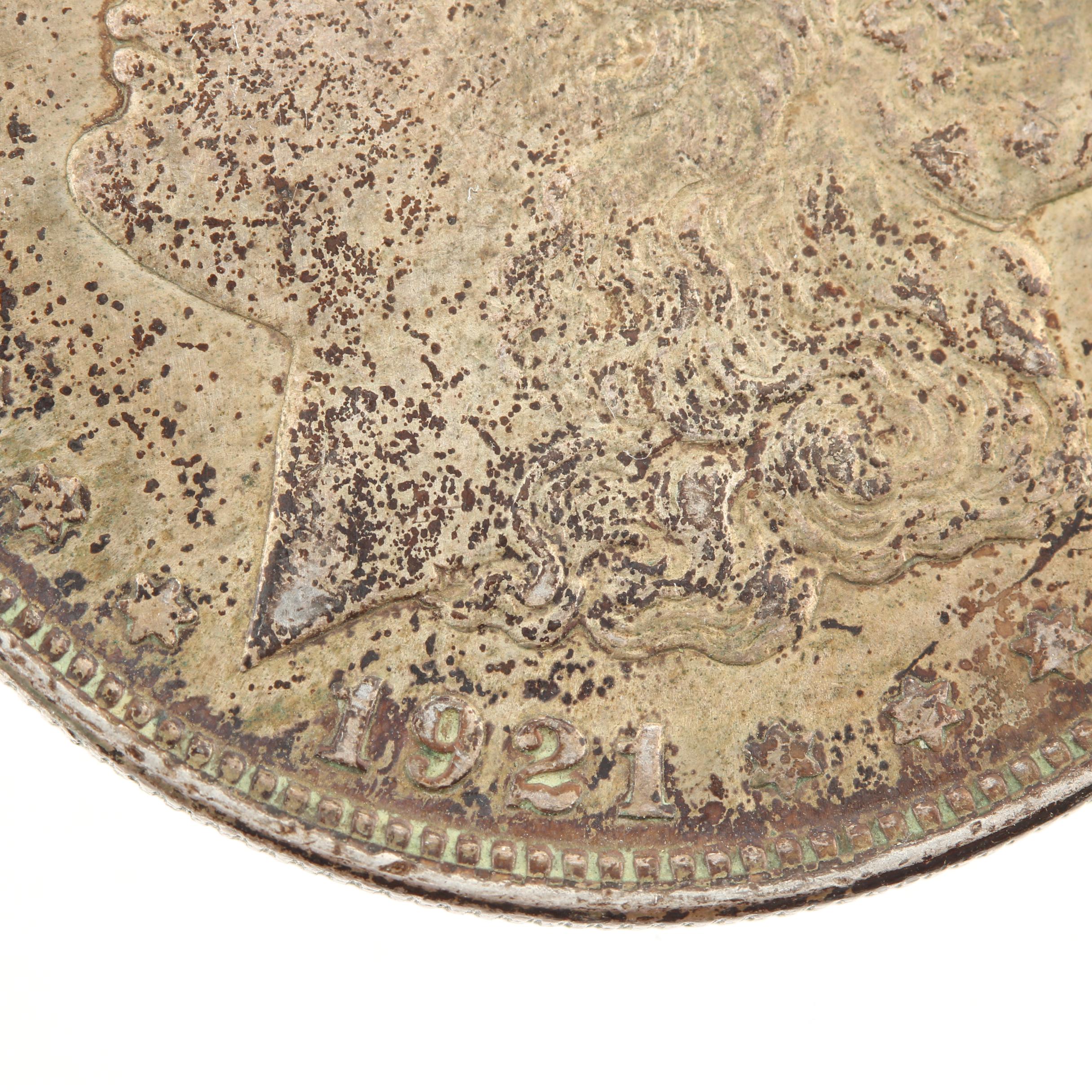 Five Morgan Silver Dollars