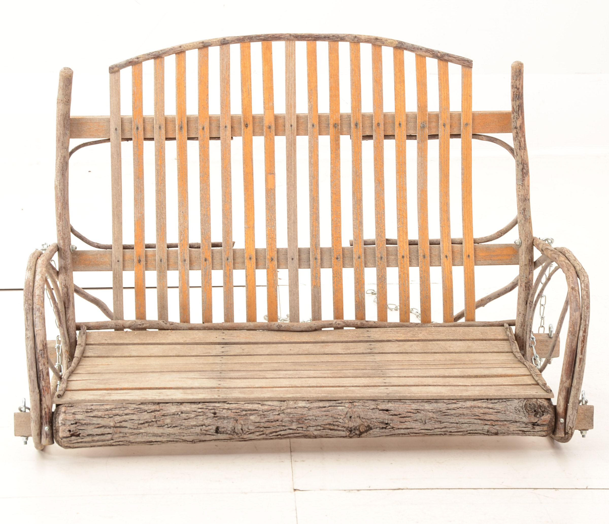 Rustic Branch and Wood Constructed Porch Swing