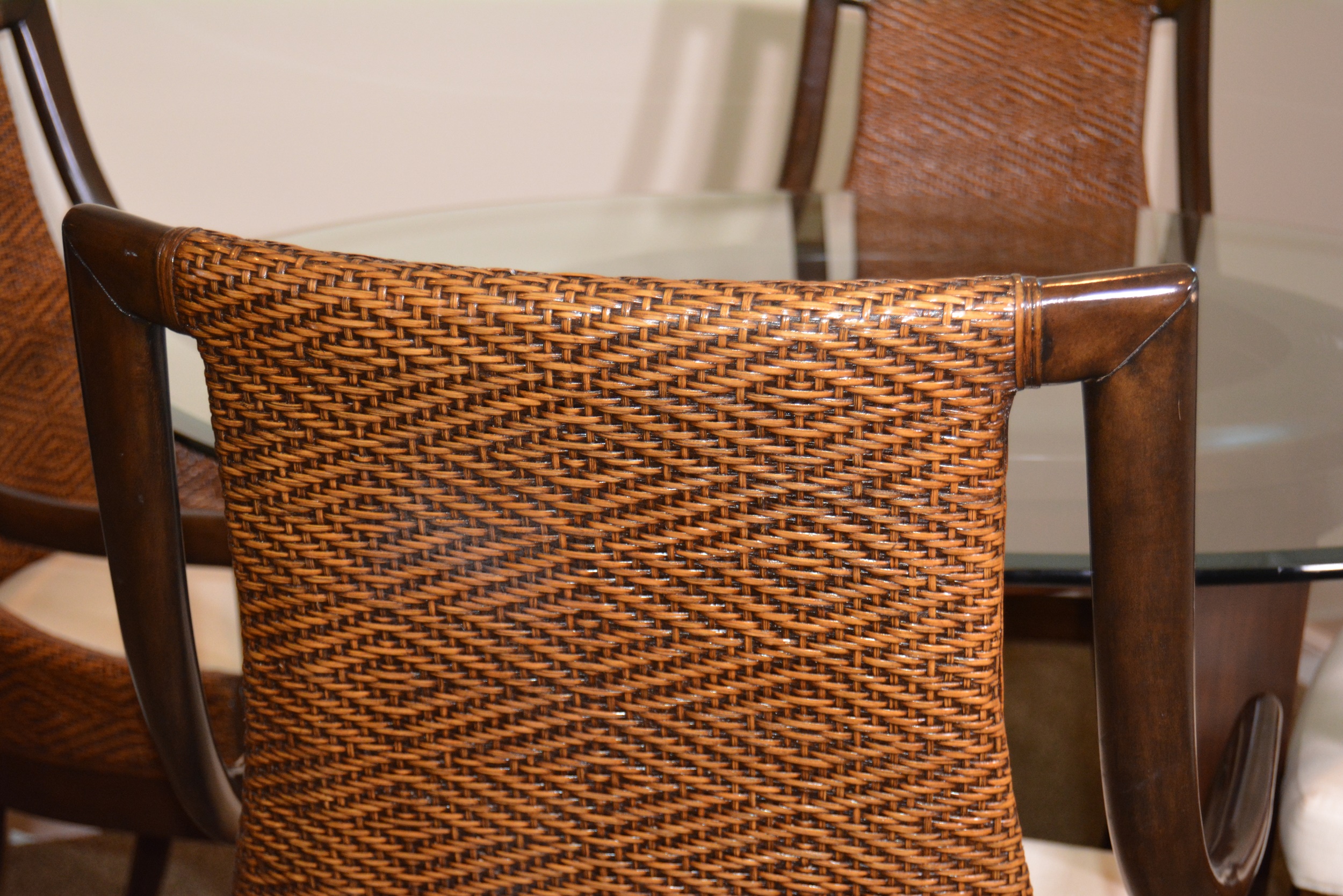 Contemporary Glass Top Round Table and Wicker Upholstered Armchairs